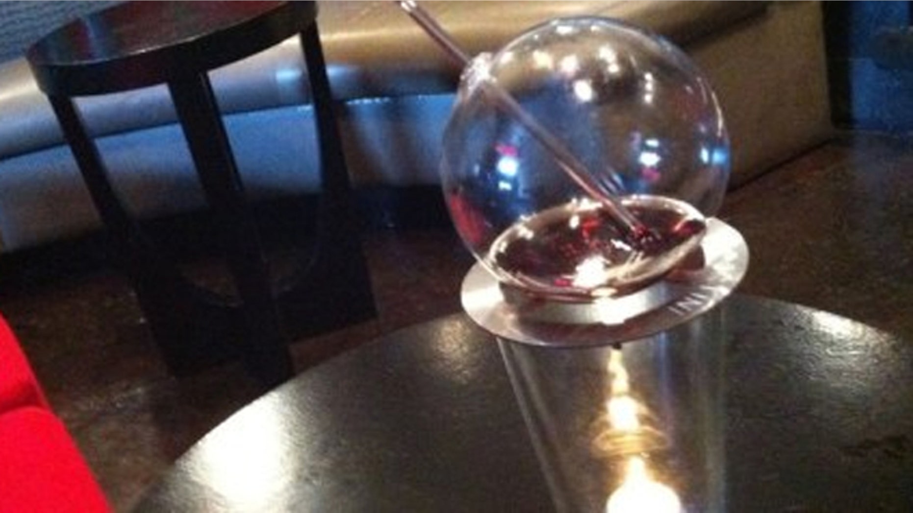 How it works: The Vaportini is filled with a shot of liquor and rests atop a pint glass. The heat from a tea-light candle in the bottom of every glass turns the liquor gaseous.