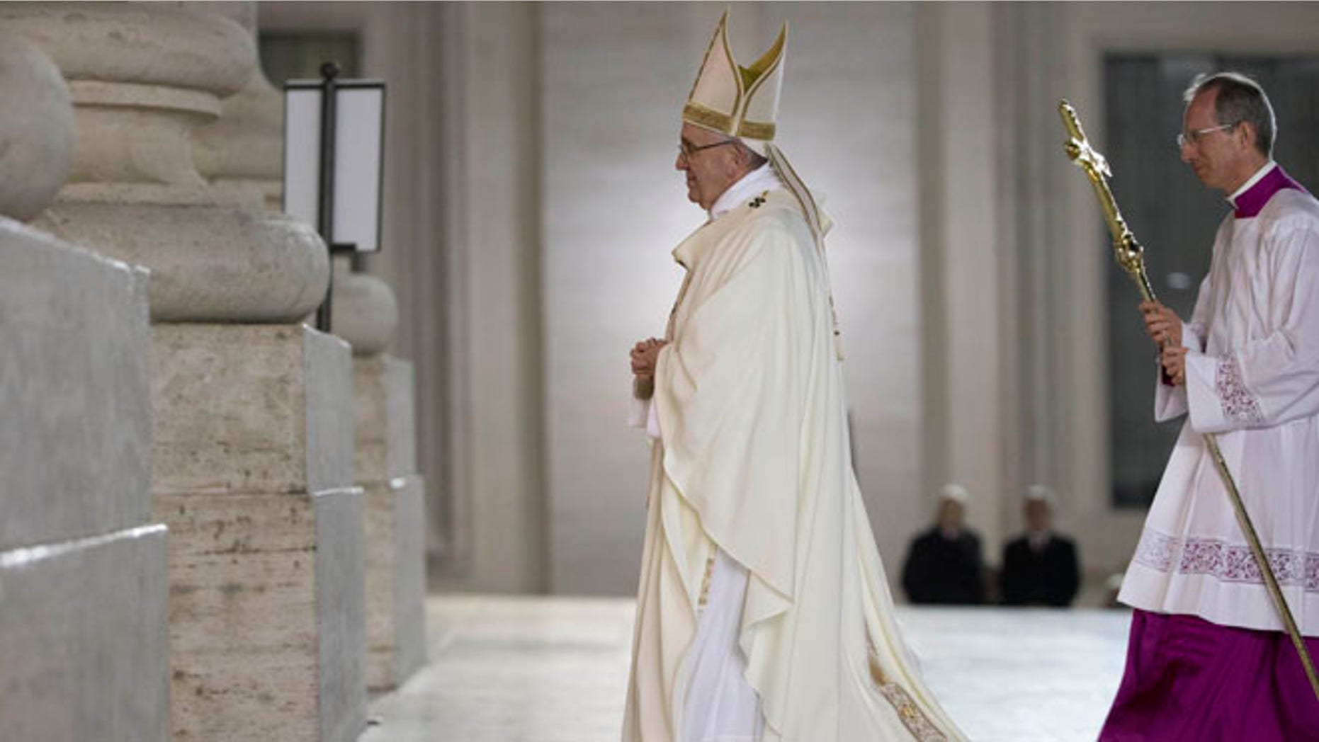 Pope Francis leaves after he greeted nuns and priests, in St. Peter's Square, at the Vatican, Tuesday, Feb. 2, 2016. The Pope earlier celebrated a mass inside the Basilica and then walked out to greet groups on nuns and priests. (AP Photo/Andrew Medichini)