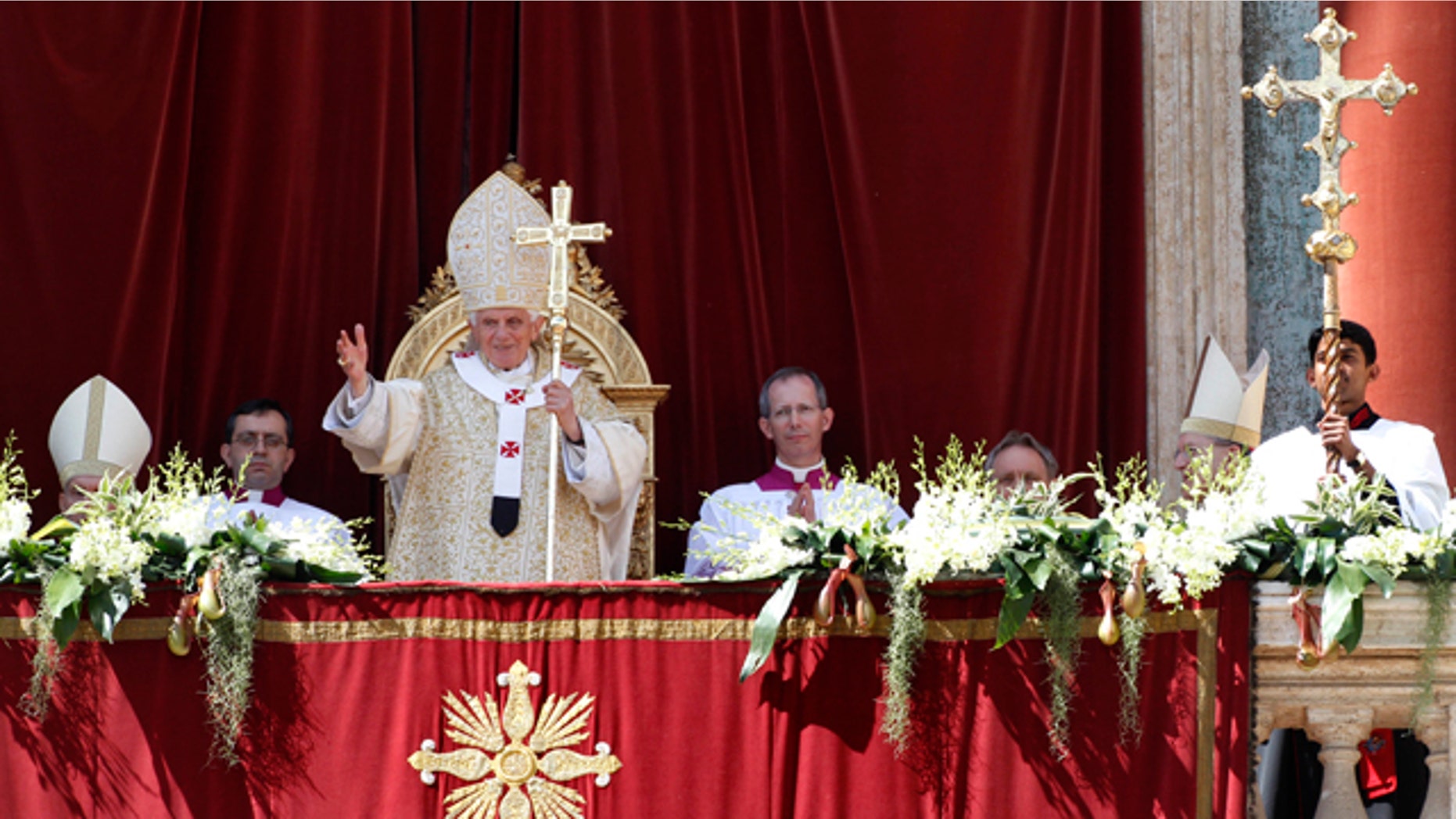 April 8: Pope Benedict XVI greets the faithful after the Urbi and Orbi blessing at the end of the Easter Mass in St. Peter's Square at the Vatican.