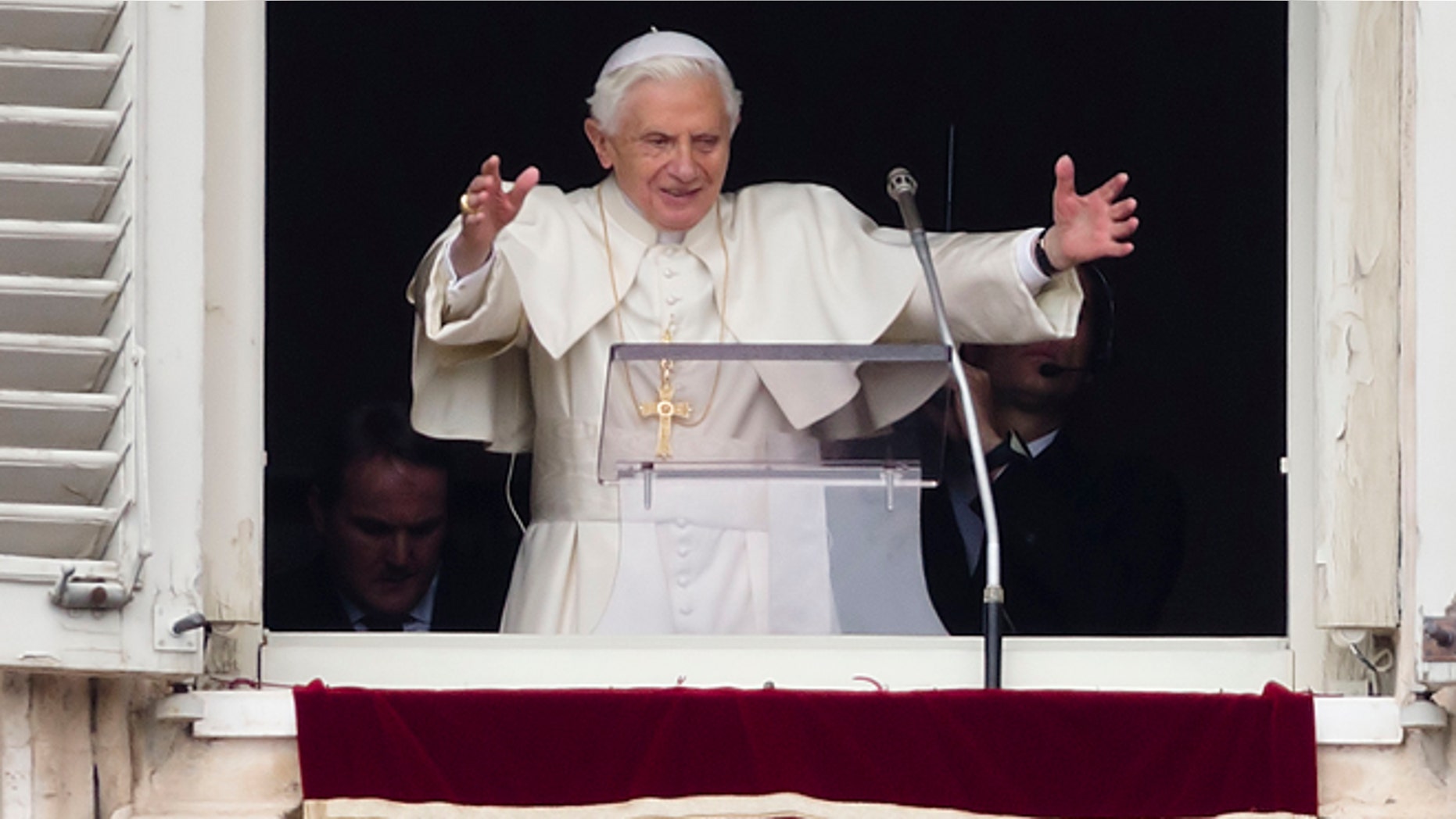 Feb. 24, 2013: Pope Benedict XVI delivers his blessing during his last Angelus noon prayer, from the window of his studio overlooking St. Peter's Square, at the Vatican.
