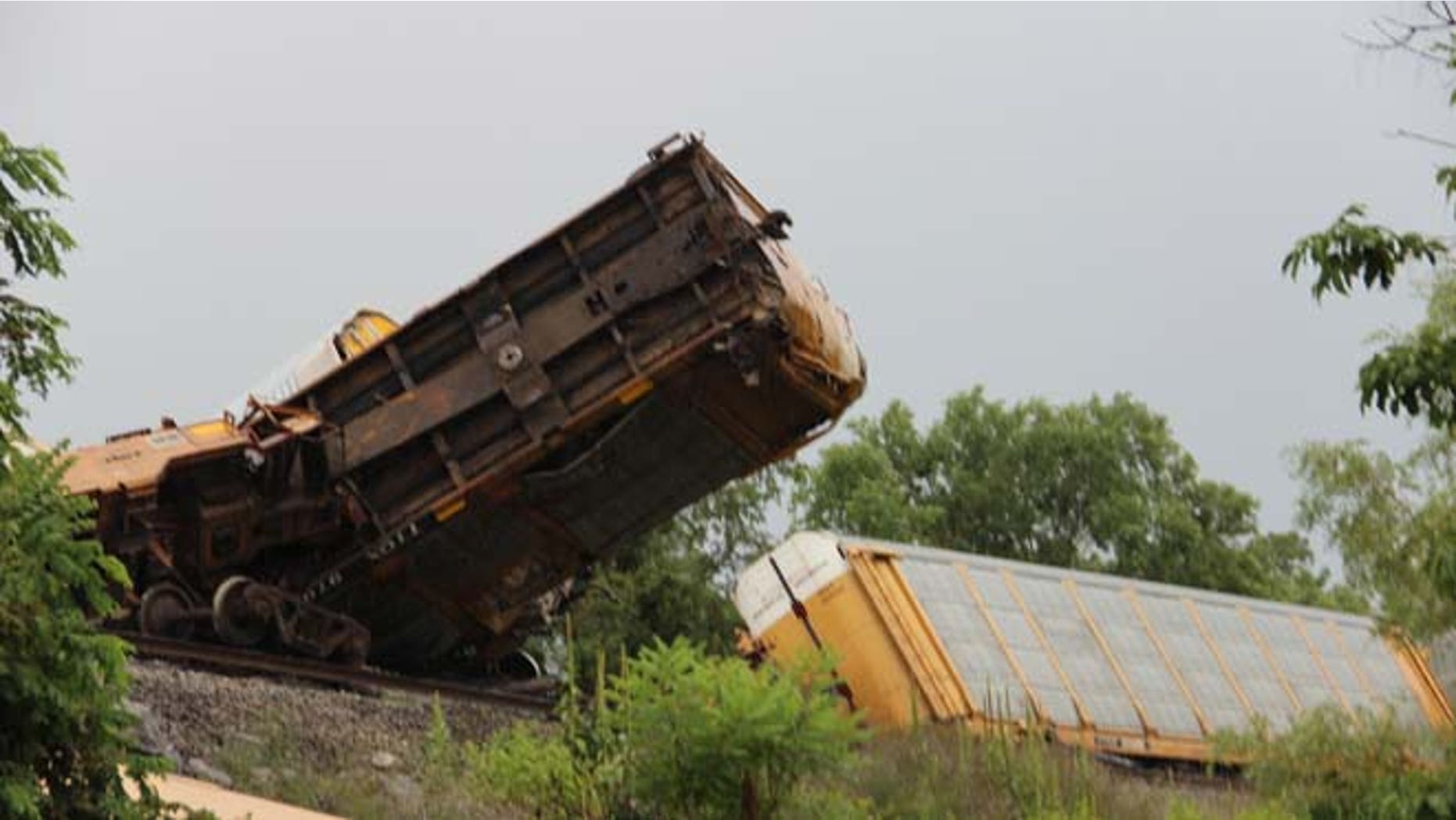 July 14, 2014: This photo provided by the Wythe County public information officer, Jeremy T.K. Farley, shows the scene after 14 railroad cars derailed in Wytheville, Va. (AP/Wythe County, Jeremy T.K. Farley)
