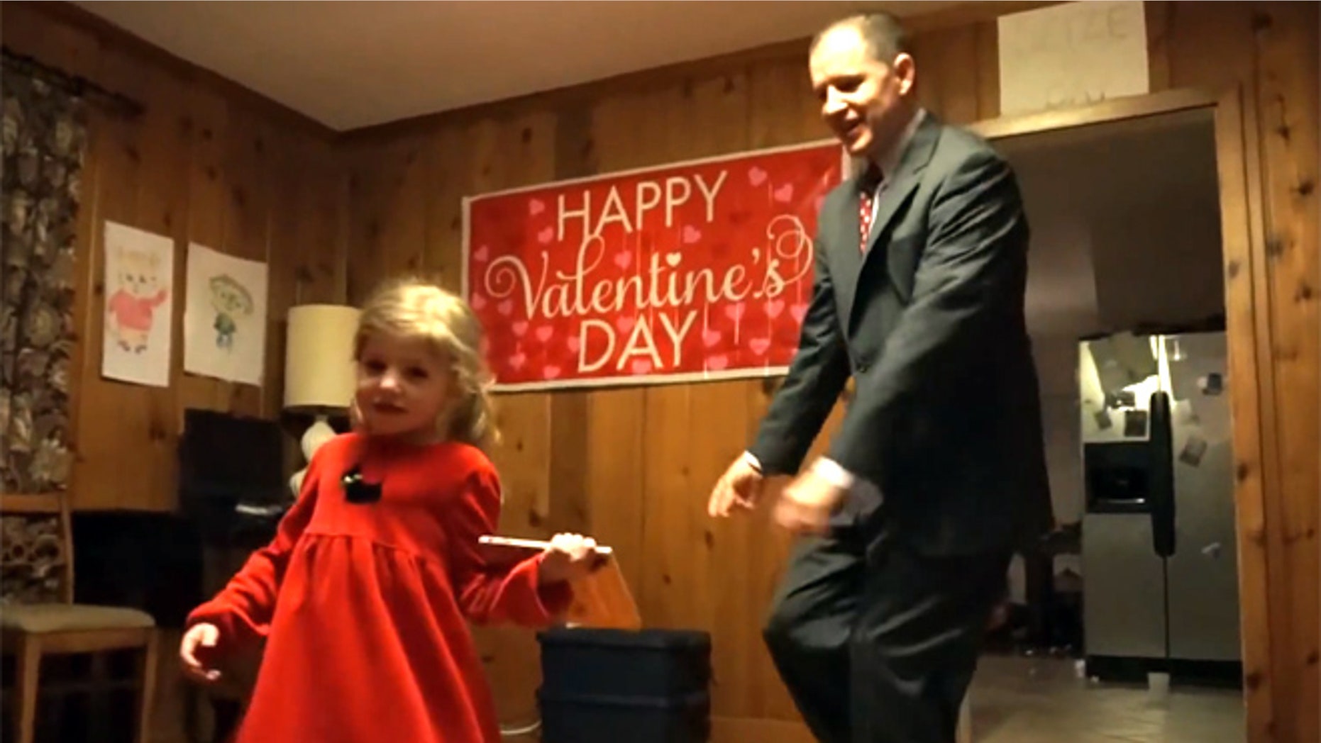 The O'Neill family recreated a school's Frozen-themed Valentine's Day dance for their daughter, Eliza, pictured with father Glenn.