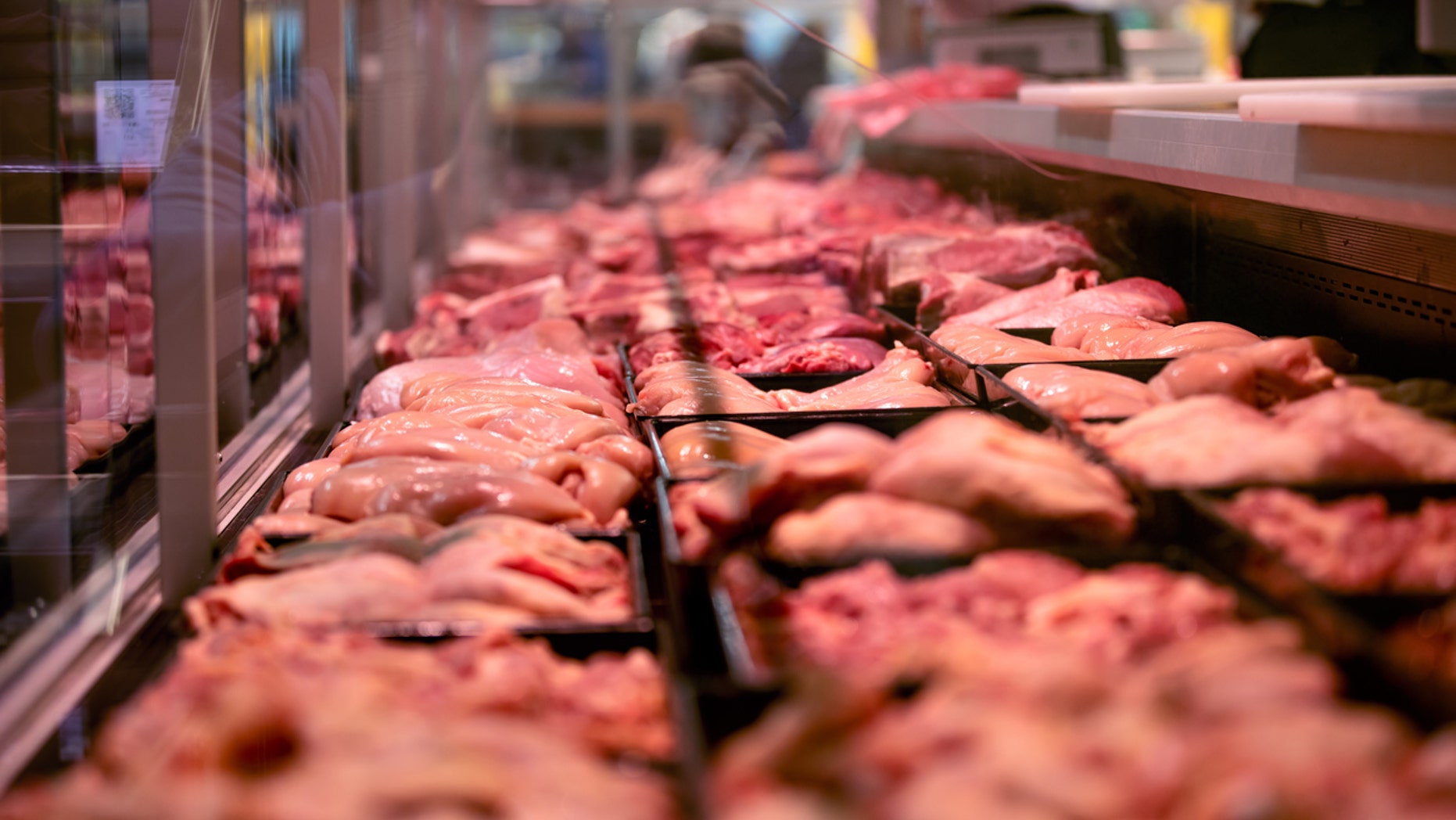 Heap of fresh raw meat food flesh background at shop supermarket.