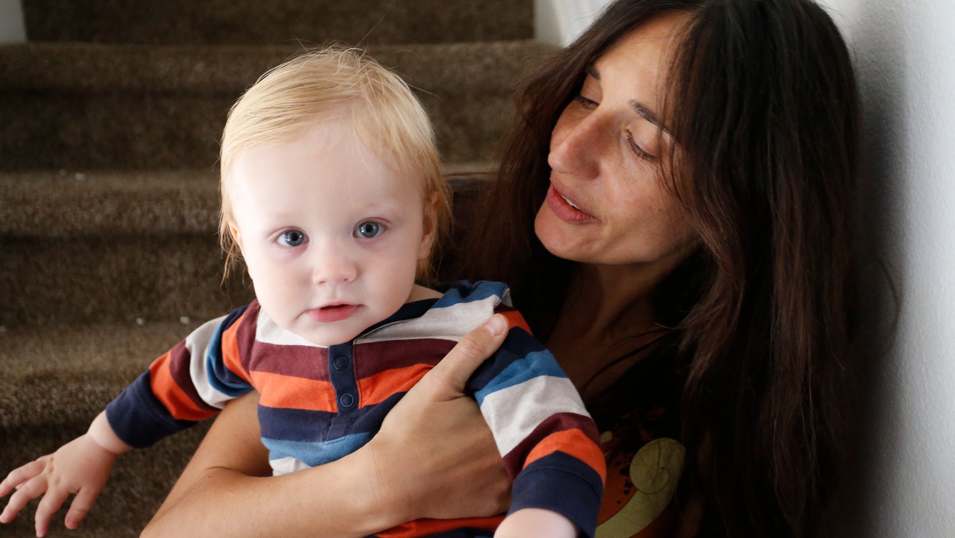 Oct. 20, 2016: In this photo, vegan mother Fulvia Serra holds her 1-year-old son Sebastiano.