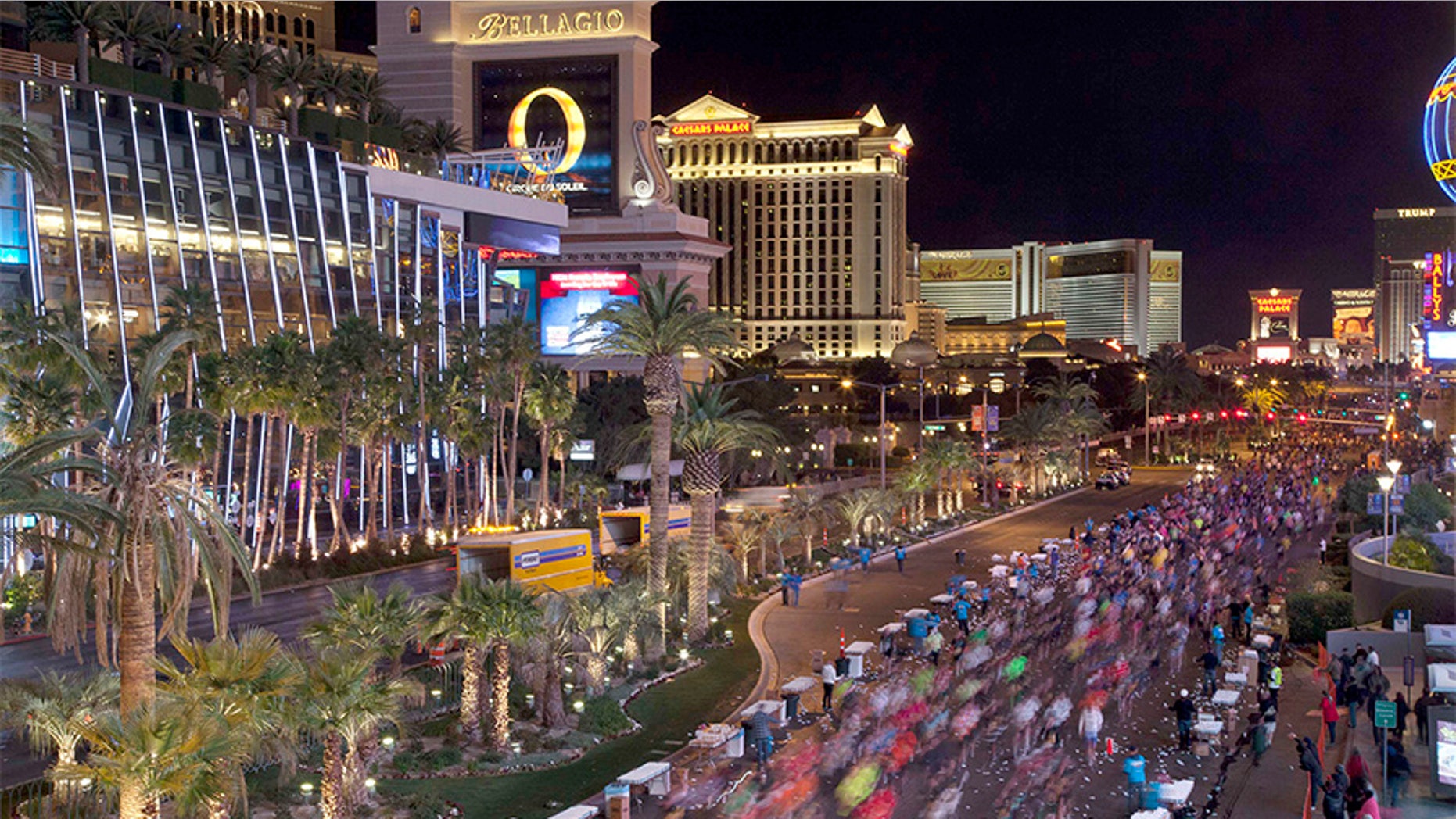 In this Dec. 4, 2011 file photo, runners stream southward on Las Vegas Boulevard during the Rock 'n Roll Las Vegas Marathon in Las Vegas.