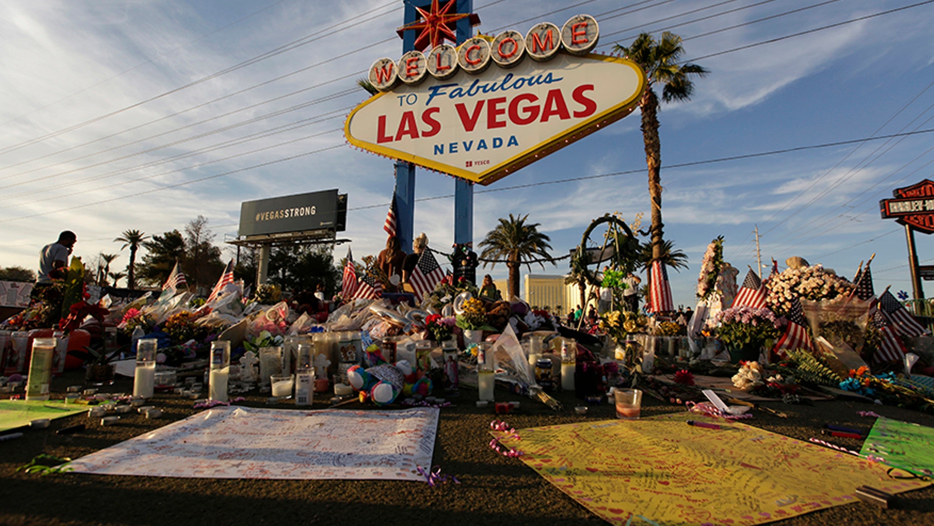 People visit a makeshift memorial on Oct. 16 for victims of the mass shooting in Las Vegas.