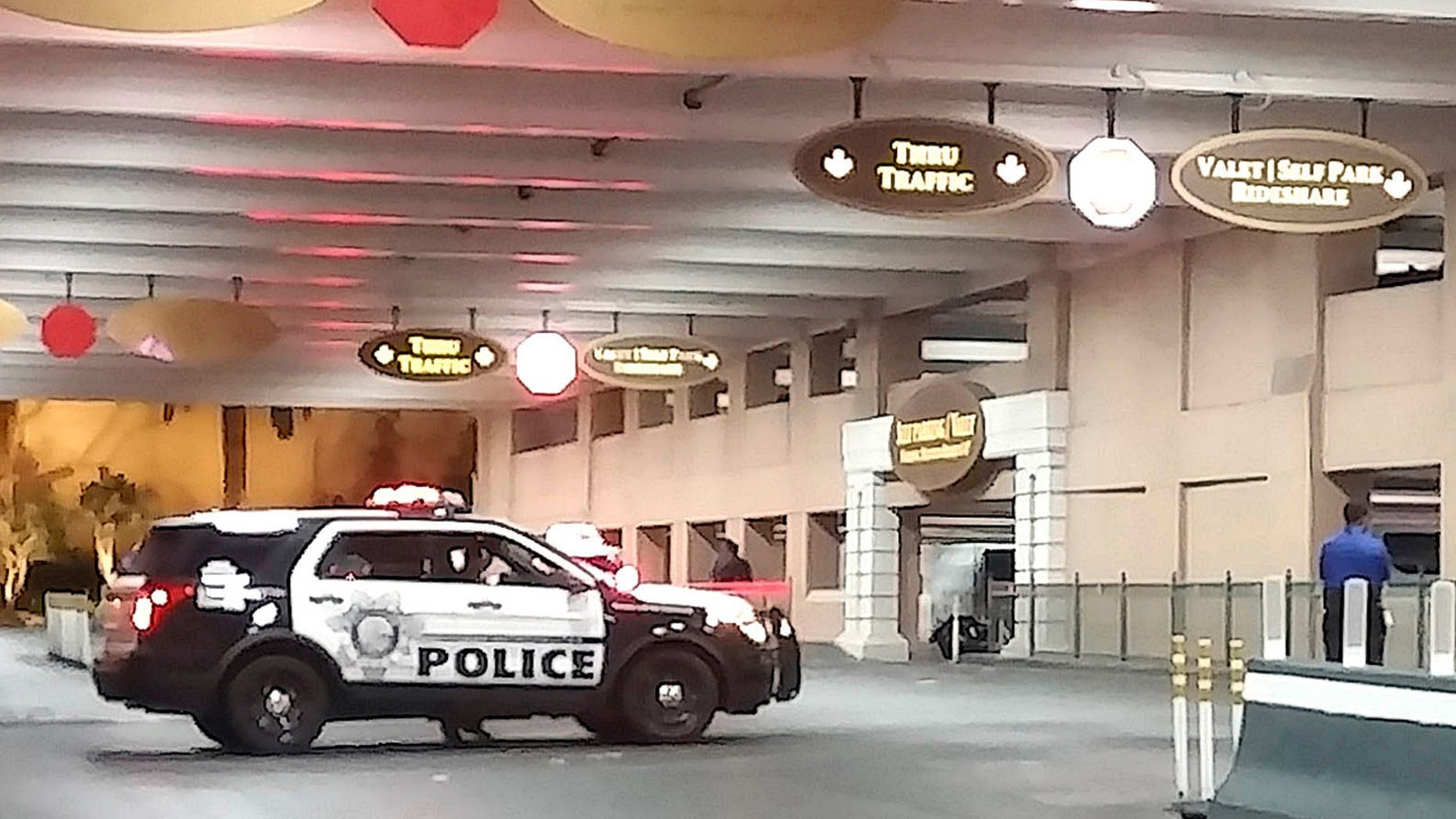 This photo taken at The Venetian Hotel and Casino in Las Vegas on Sunday, March 14, 2017, shows the scene where an unarmed man died after police squeezed his neck during a struggle to subdue him. The American Civil Liberties Union of Nevada, which led a push for use-of-force reforms after Las Vegas police were involved in 25 shootings in 2010, said Monday, May 15, 2017, that it will seek a review of the training that allows officers to use what the department calls "lateral vascular neck restrain." (Billy Winkler via AP)