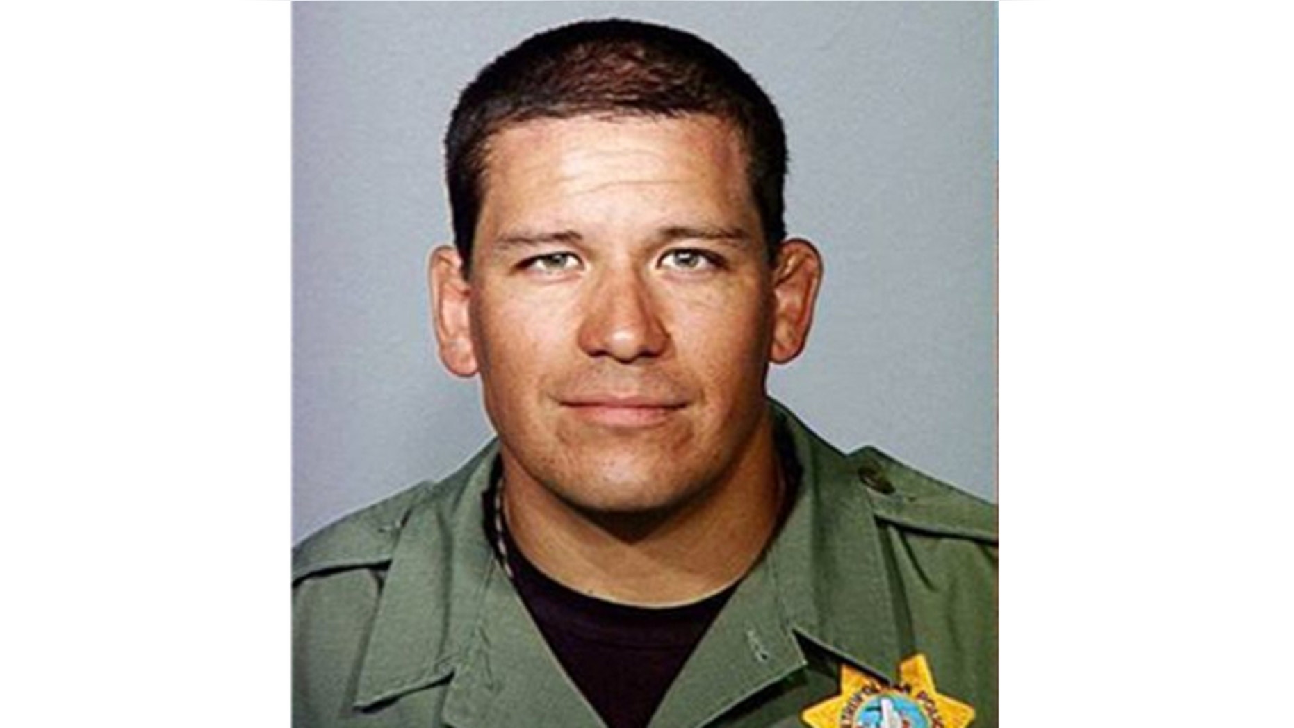 UNDATED: This photo released by the Las Vegas Metropolitan Police Dept. shows search & rescue officer David Vanbuskirk, 36, who died when he fell during the helicopter rescue of a stranded hiker.