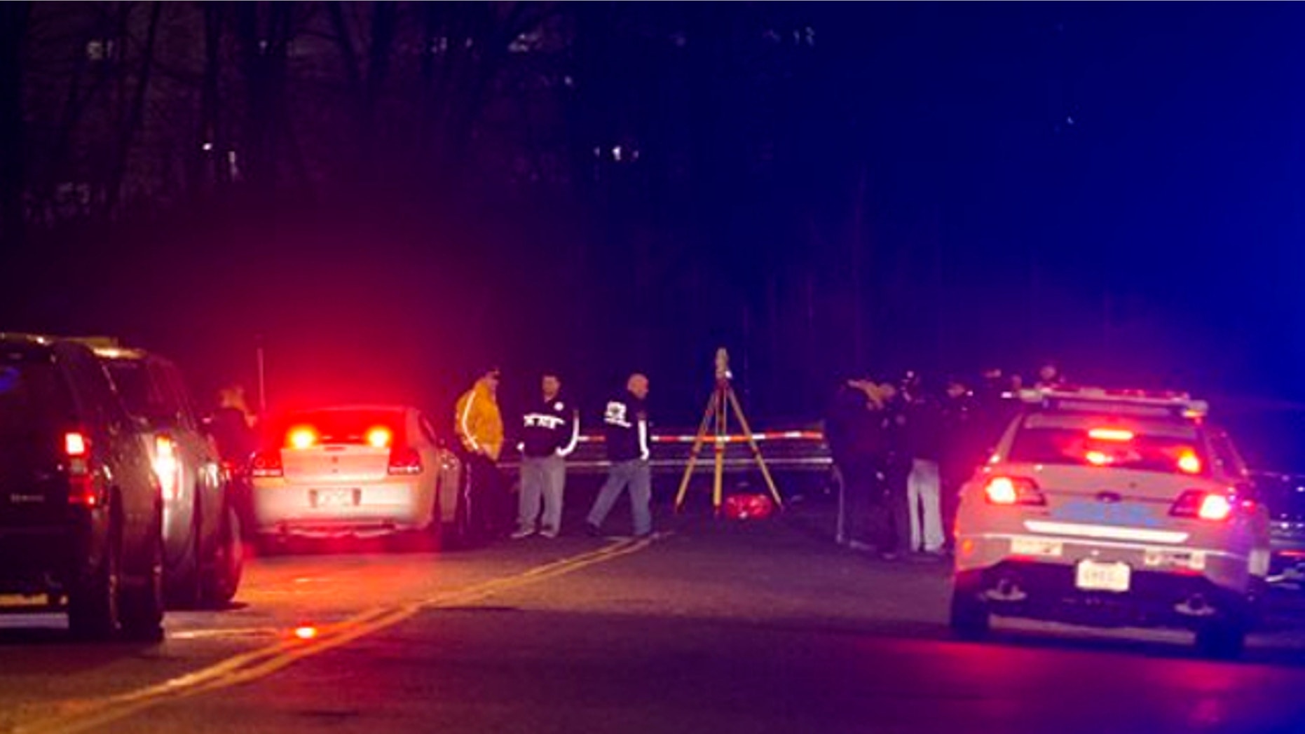 April 5, 2014: Police investigate the scene of an accident on a dead-end street where a car containing five passengers plunged into Steinway Creek in the Astoria neighborhood of Queens in New York.