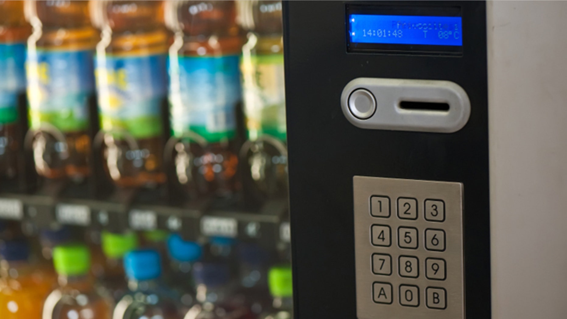 A vending machine provides various beverages
