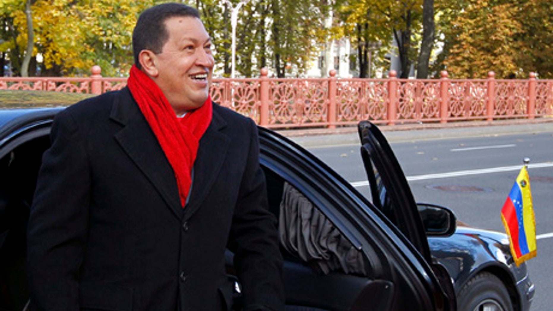 Venezuelan President Hugo Chavez arrives to meet his Belarusian counterpart in Minsk, Belarus Saturday Oct. 16, 2010. Chavez will meet with his Belarusian counterpart Alexander Lukashenko in Minks on Saturday to discuss trade and economic relations between the two countries. Chavez flew to the Belarusian capital from Moscow as part of his international tour, which also includes Ukraine and Iran. (AP Photo//Vasily Fedosenko, Pool)
