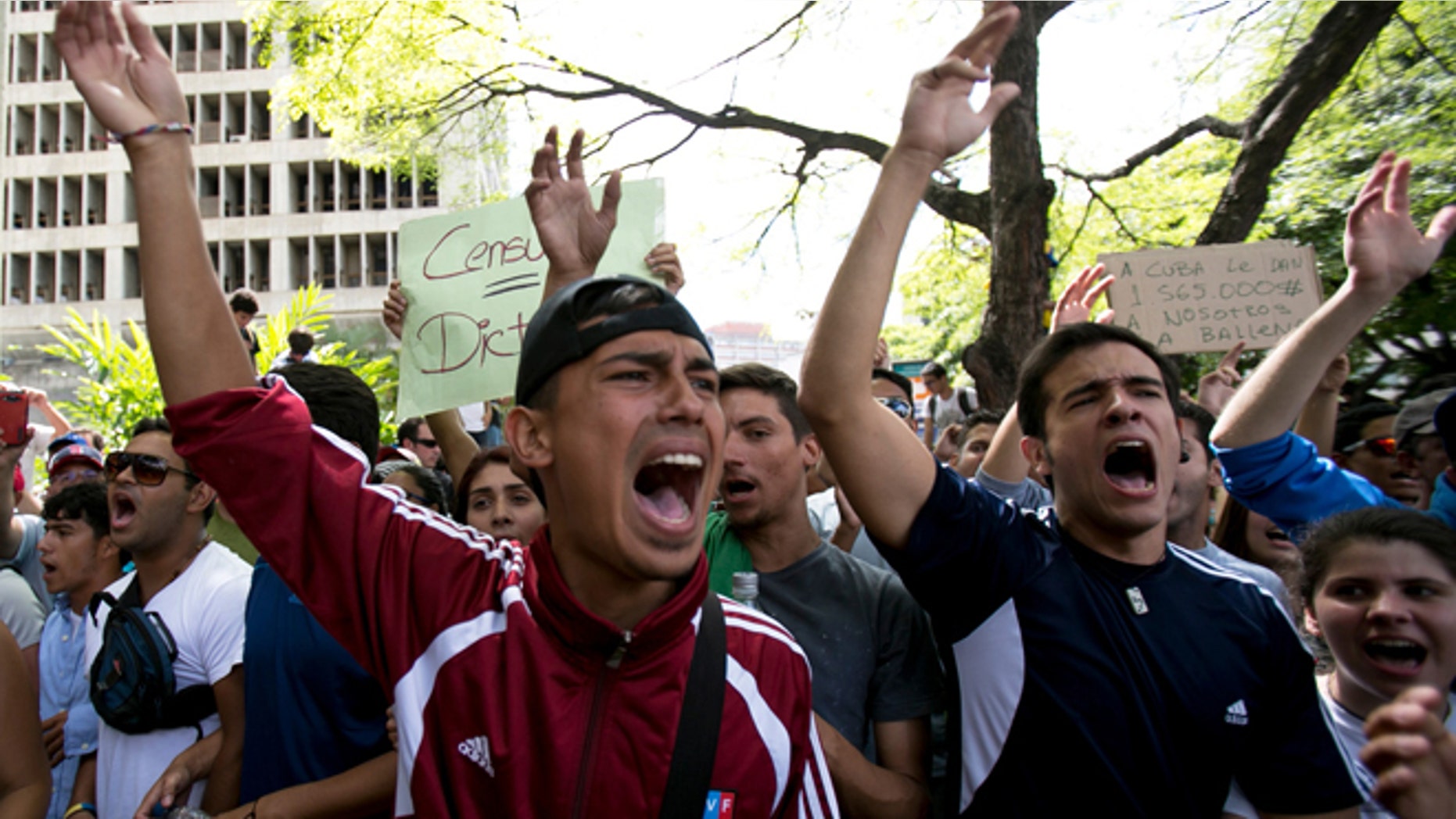Feb. 17, 2014: Students shout slogans against Venezuela's President Nicolas Maduro during a march to Venezuelan Telecommunications Regulator Office or CONATEL in Caracas, Venezuela.
