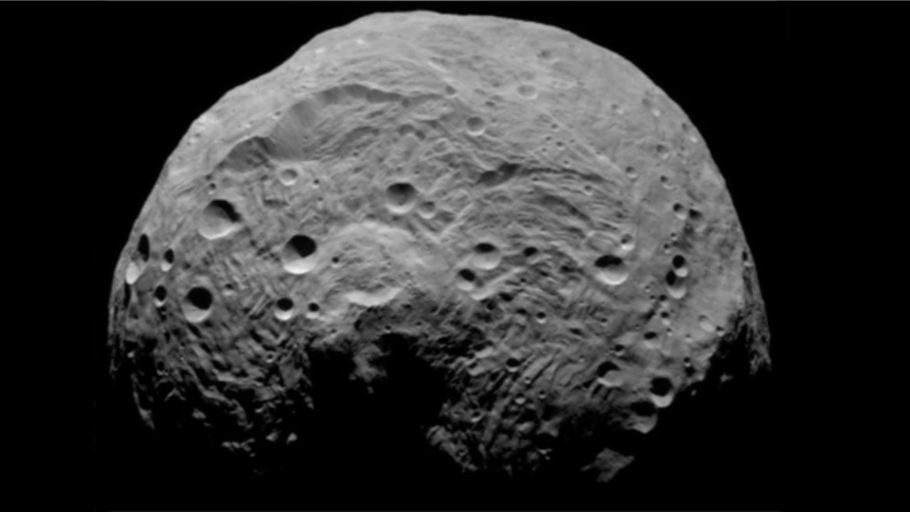 Located in the asteroid belt between Mars and Jupiter, Vesta is not your garden-variety asteroid. Measuring 330 miles across, it's the second largest object in the asteroid belt.