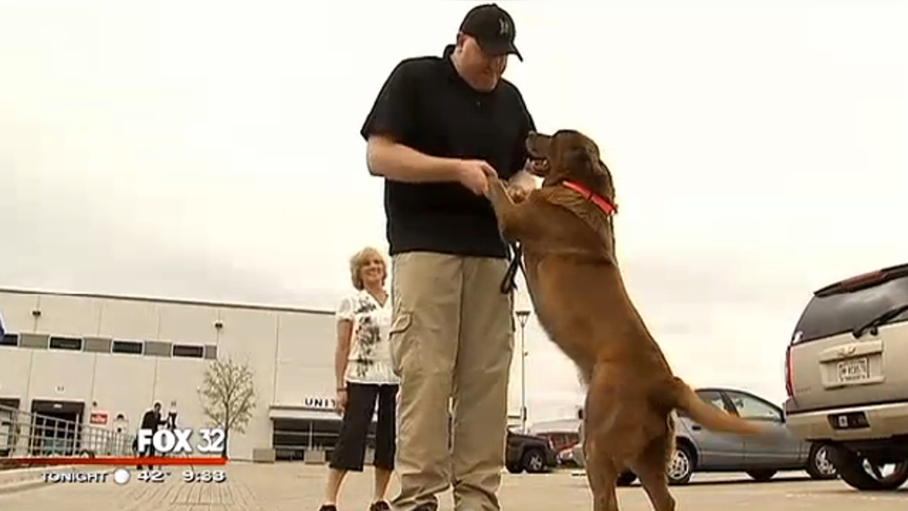 April 30, 2014: Sgt. Jason Bos was reunited with MWD Cila M389, a Labrador Retriever, at Chicago O'Hare International Airport.