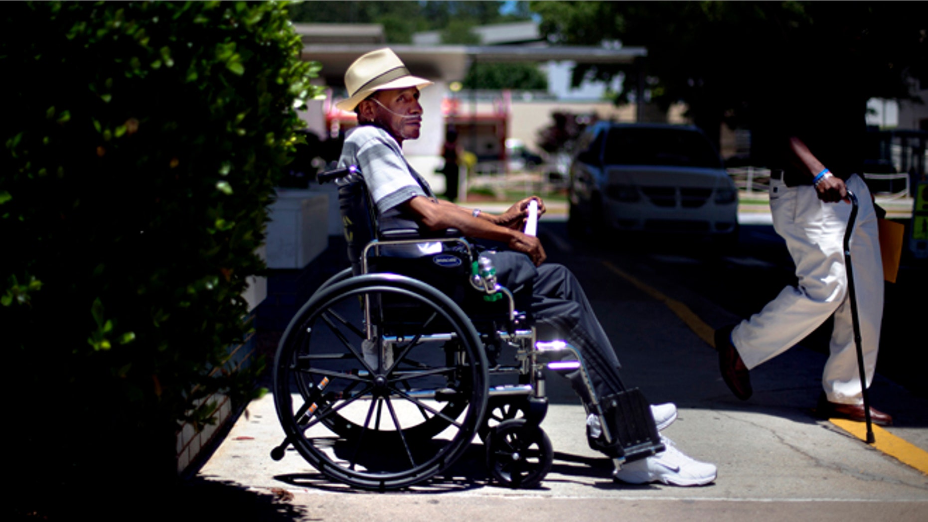 May 24, 2013, Veteran Roy Wiltz, 66, waits to be picked up outside the Atlanta VA Medical Center after a medical appointment, in Atlanta, Ga.