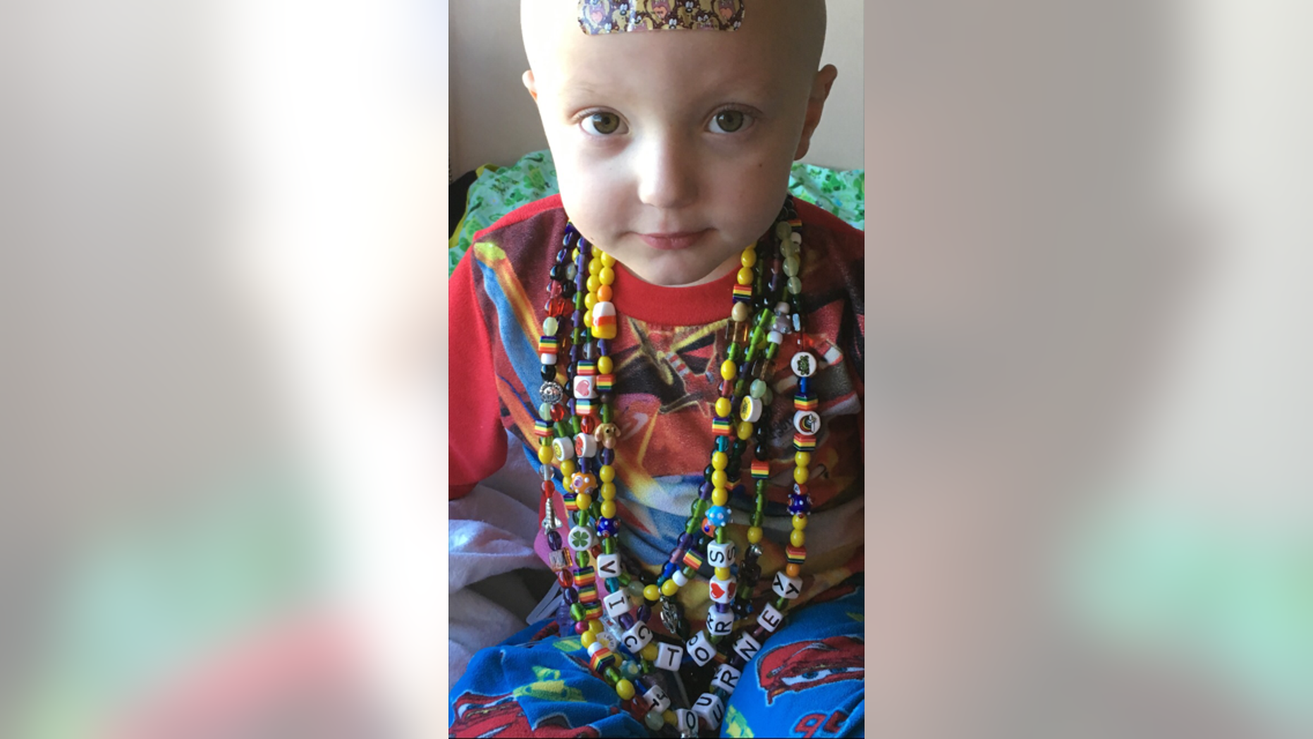 Victor Sciarrotta, 5, collects beads during doctor's appointments and hospital visits as he battles a very aggressive brain cancer. His mother, Amber Sciarrotta, said he "loves his beads" and that they lay them around on the floor to talk about all the things they represent.