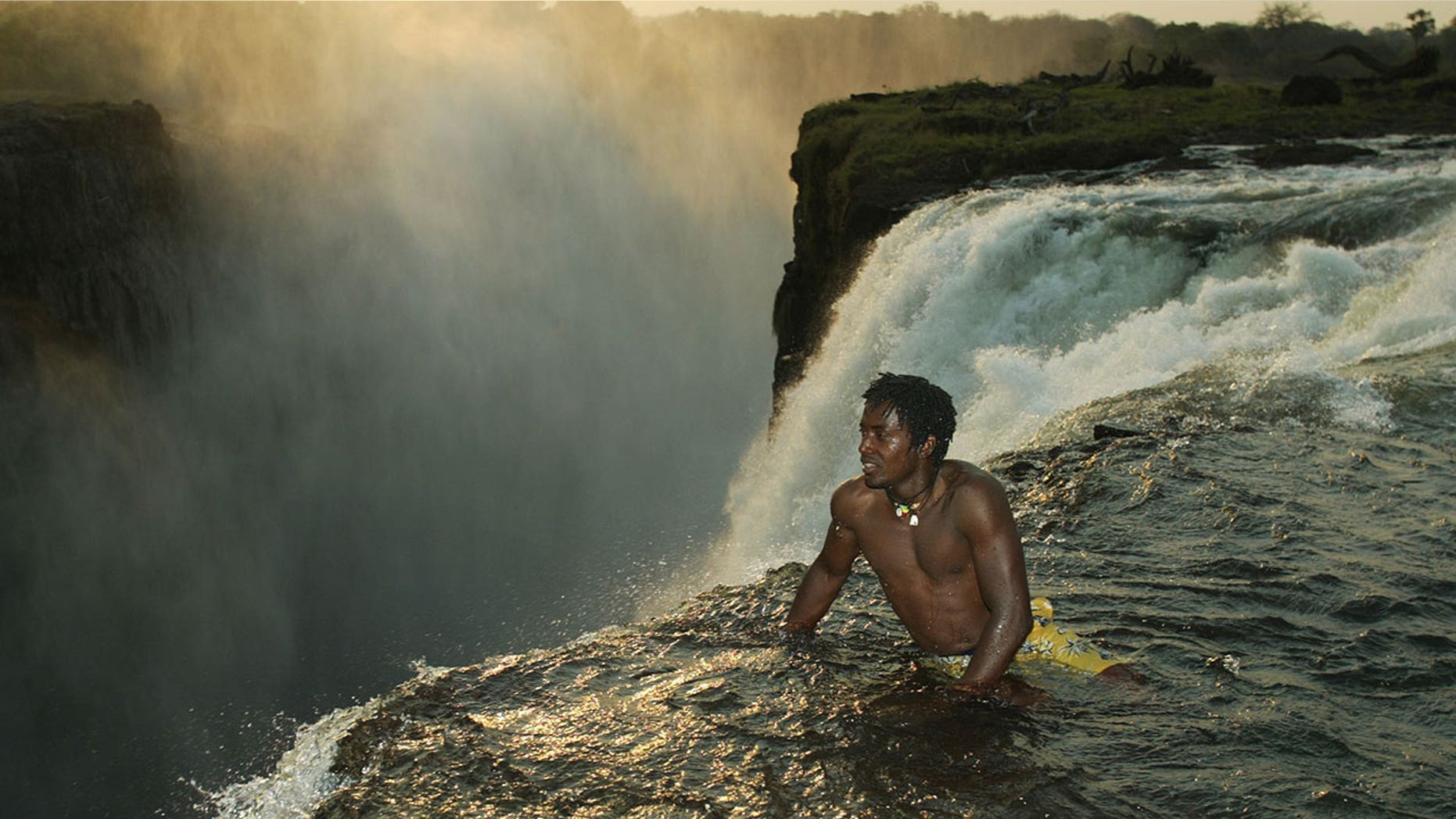 The Devil's Swimming Pool is shallow natural pool atop Victoria Falls.