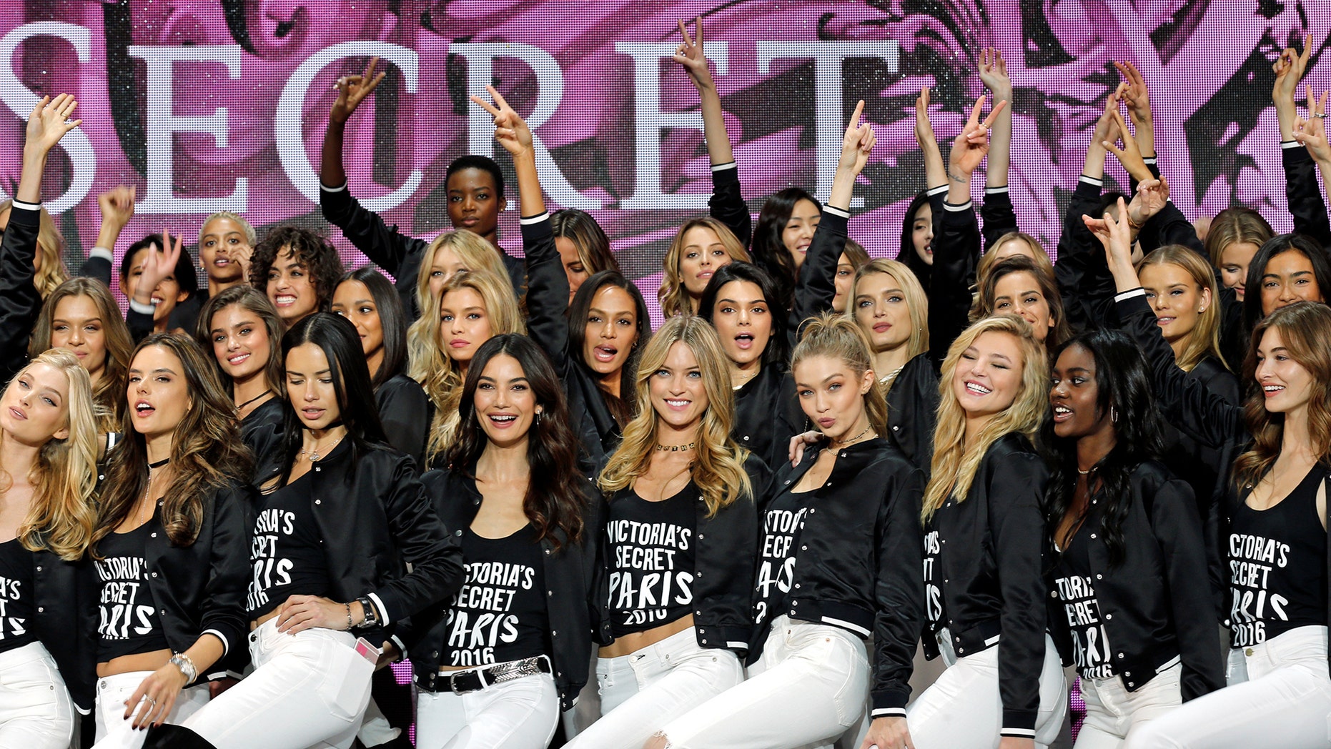 Models including Kendall Jenner, Gigi Hadid and Lily Donaldson pose for a group photograph during a photocall before the Victoria's Secret Fashion Show at the Grand Palais in Paris, France, November 28, 2016.