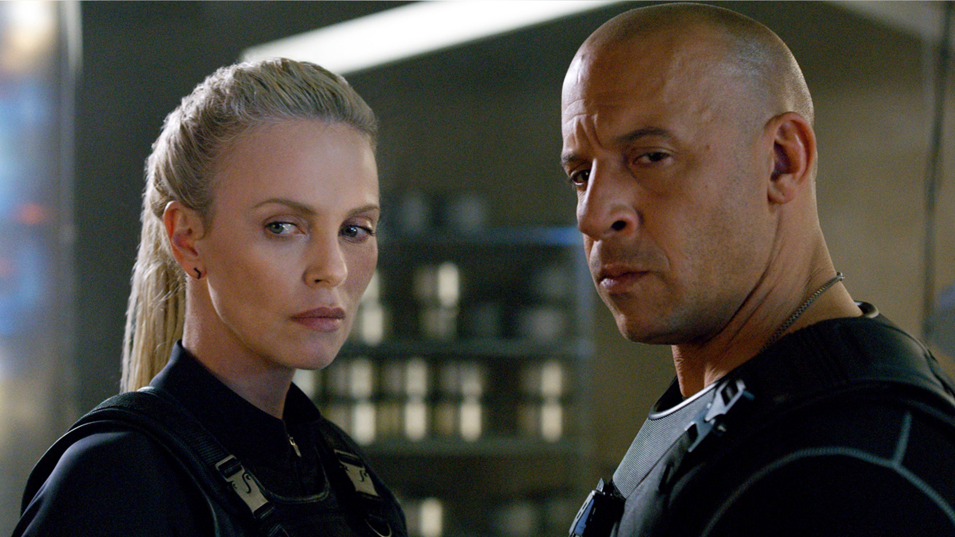 This image released by Universal Pictures shows Charlize Theron, left, and Vin Diesel in "The Fate of the Furious." (Universal Pictures via AP)