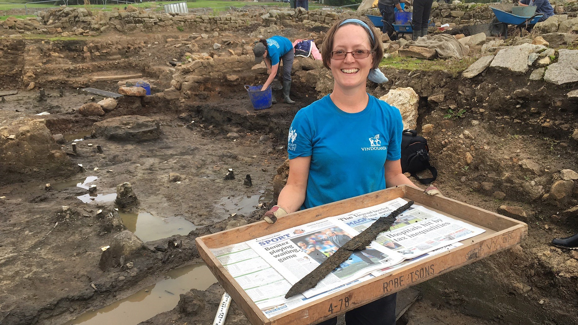 Volunteer Sarah Baker who discovered the second sword at Vindolanda (The Vindolanda Trust).