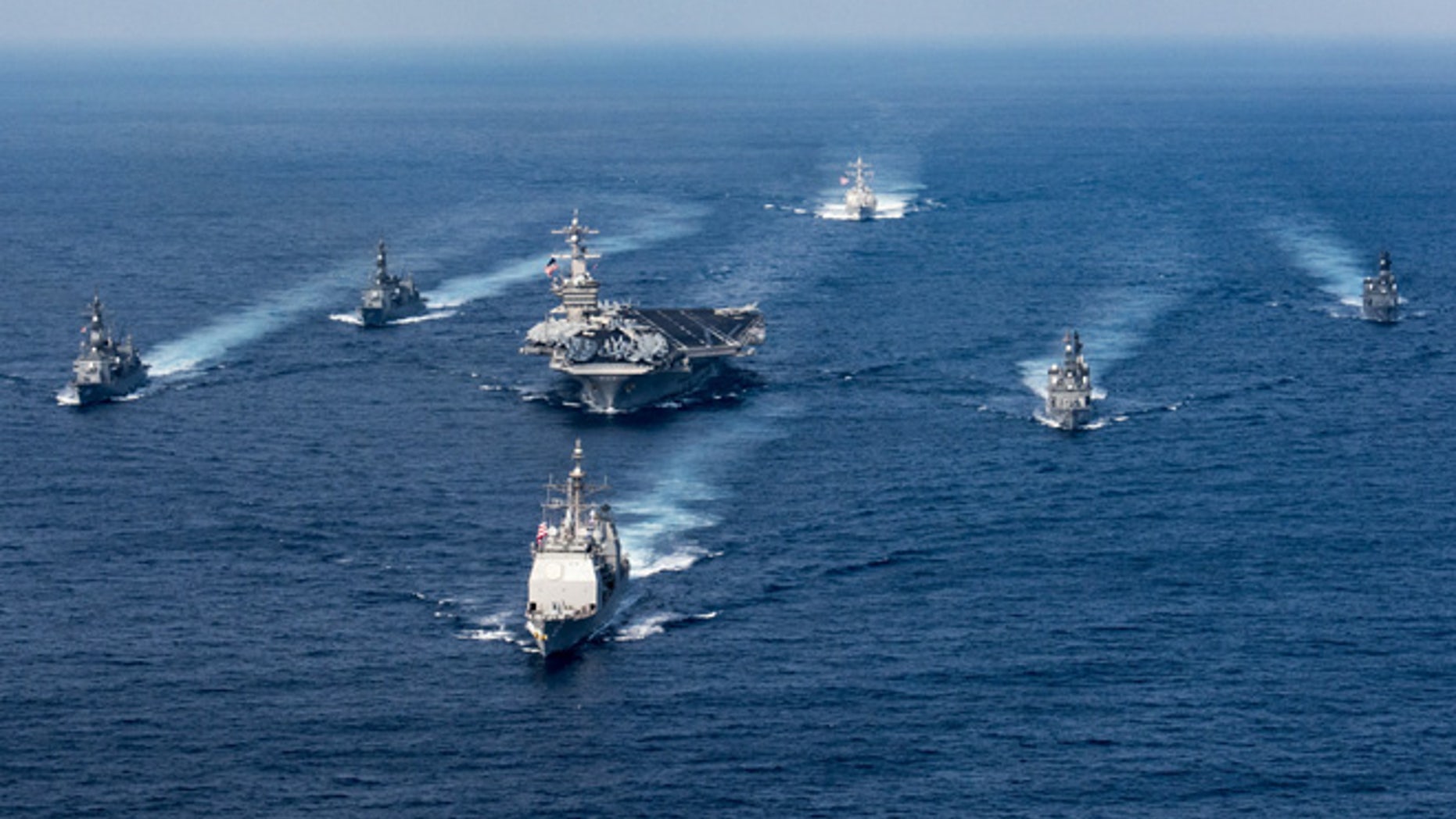 The USS Carl Vinson (CVN 70), the guided-missile destroyer USS Wayne E. Meyer (DDG 108) and the guided-missile cruiser USS Lake Champlain (CG 57) on deployment to the Western Pacific.