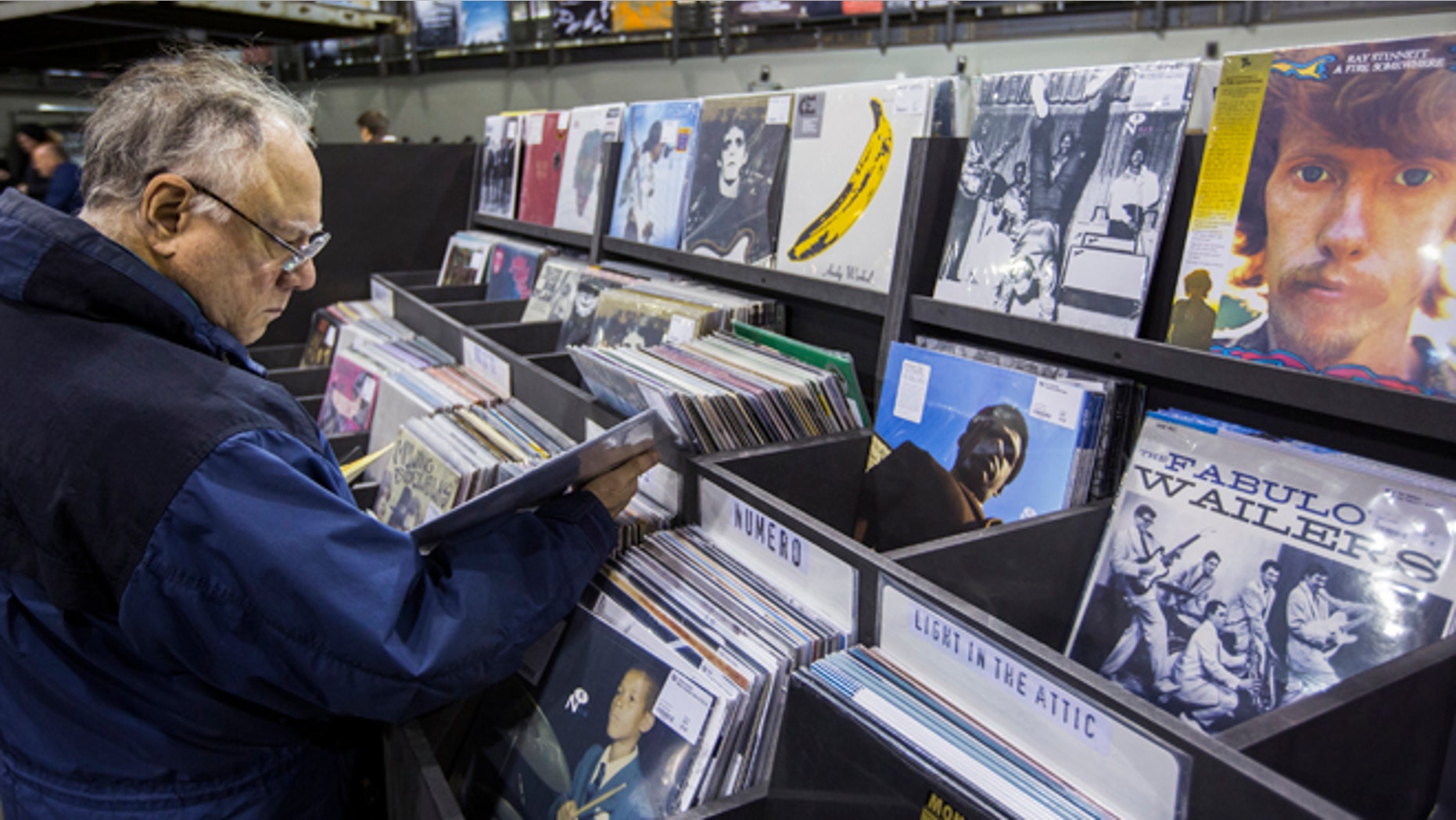 Nov. 25, 2013: A man peruses albums displayed inside of the record store Rough Trade in the Williamsburg neighborhood of Brooklyn.