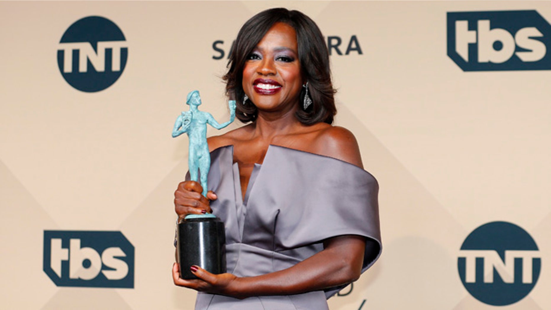 January 30, 2016. Viola Davis holds the award for Outstanding Performance by a Female Actor in a Drama Series for her role in "How to Get Away With Murder" during the 22nd Screen Actors Guild Awards in Los Angeles.