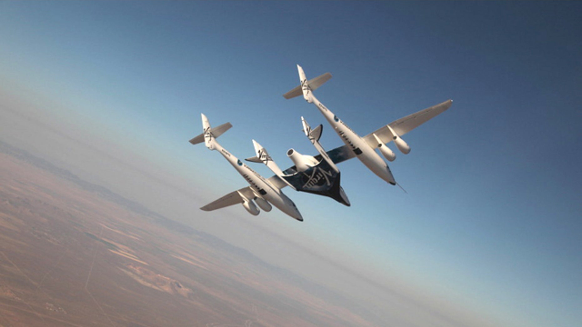 The Virgin Galactic suborbital spaceliner SpaceShipTwo makes its first crewed flight on July 15, 2010 over the Mojave Desert in California, one of a series of test flights before the first free flight of the passenger ship for space tourism flights.