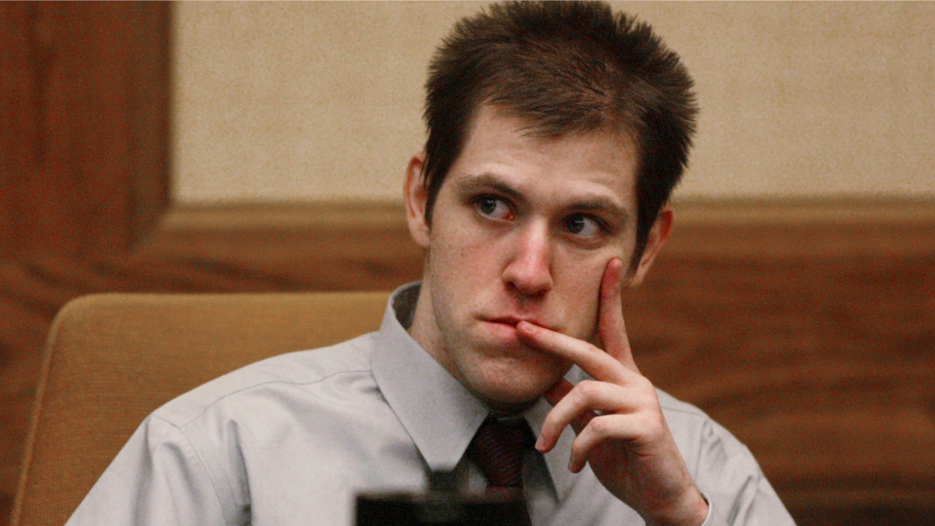 In this Thursday March 29, 2007, file photo, William Morva watches as prospective jury members are interviewed to serve in his attempted robbery trial in Montgomery County Circuit Court in Christiansburg, Va.