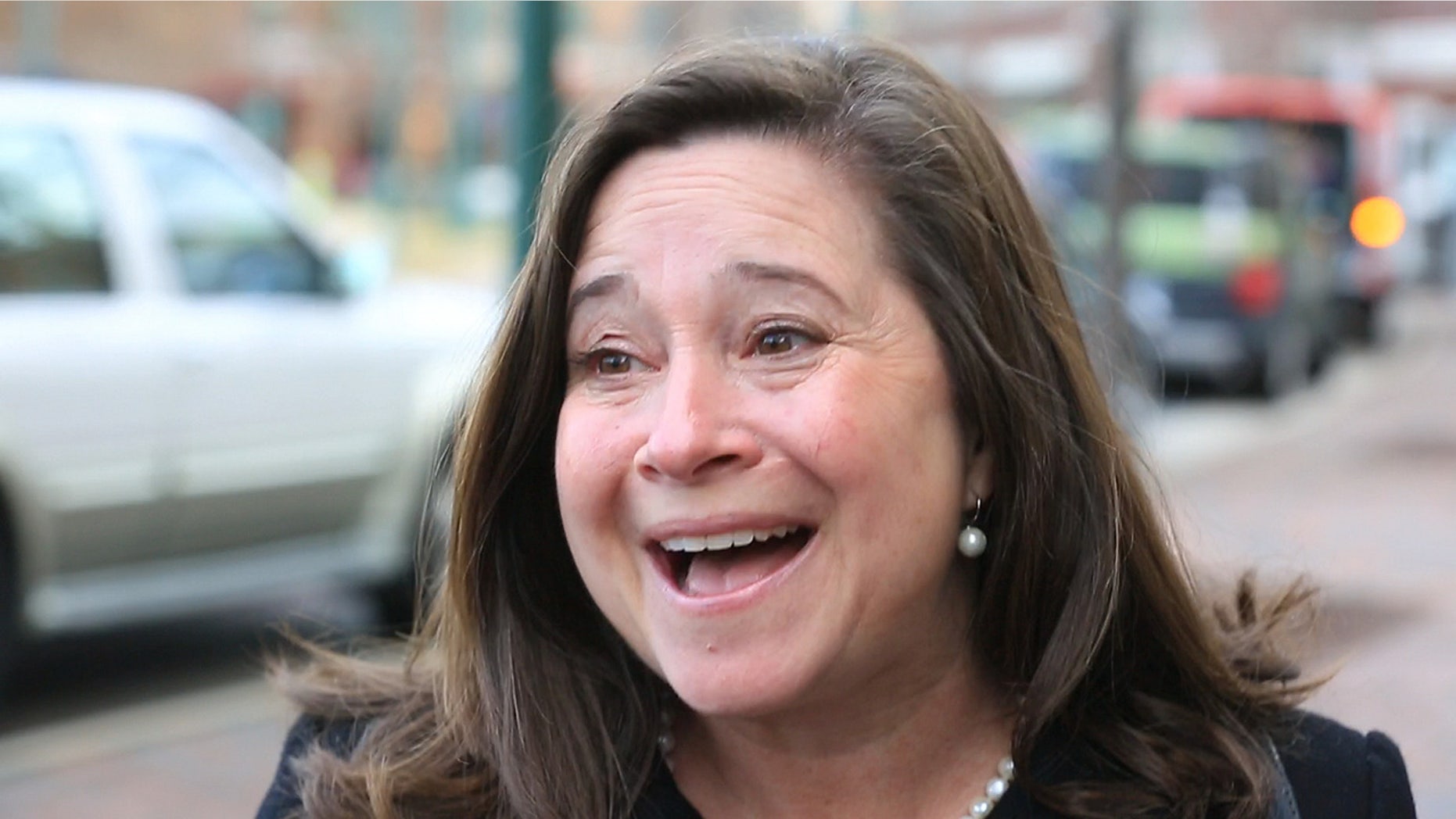 Democrat Shelly Simonds reacts to the news that she won the 94th District precincts by one vote after previously trailing incumbent David Yancey by ten votes post-election, following a recount Tuesday, Dec. 19, 2017, in Hampton, Va. (Joe Fudge/The Daily Press via AP)