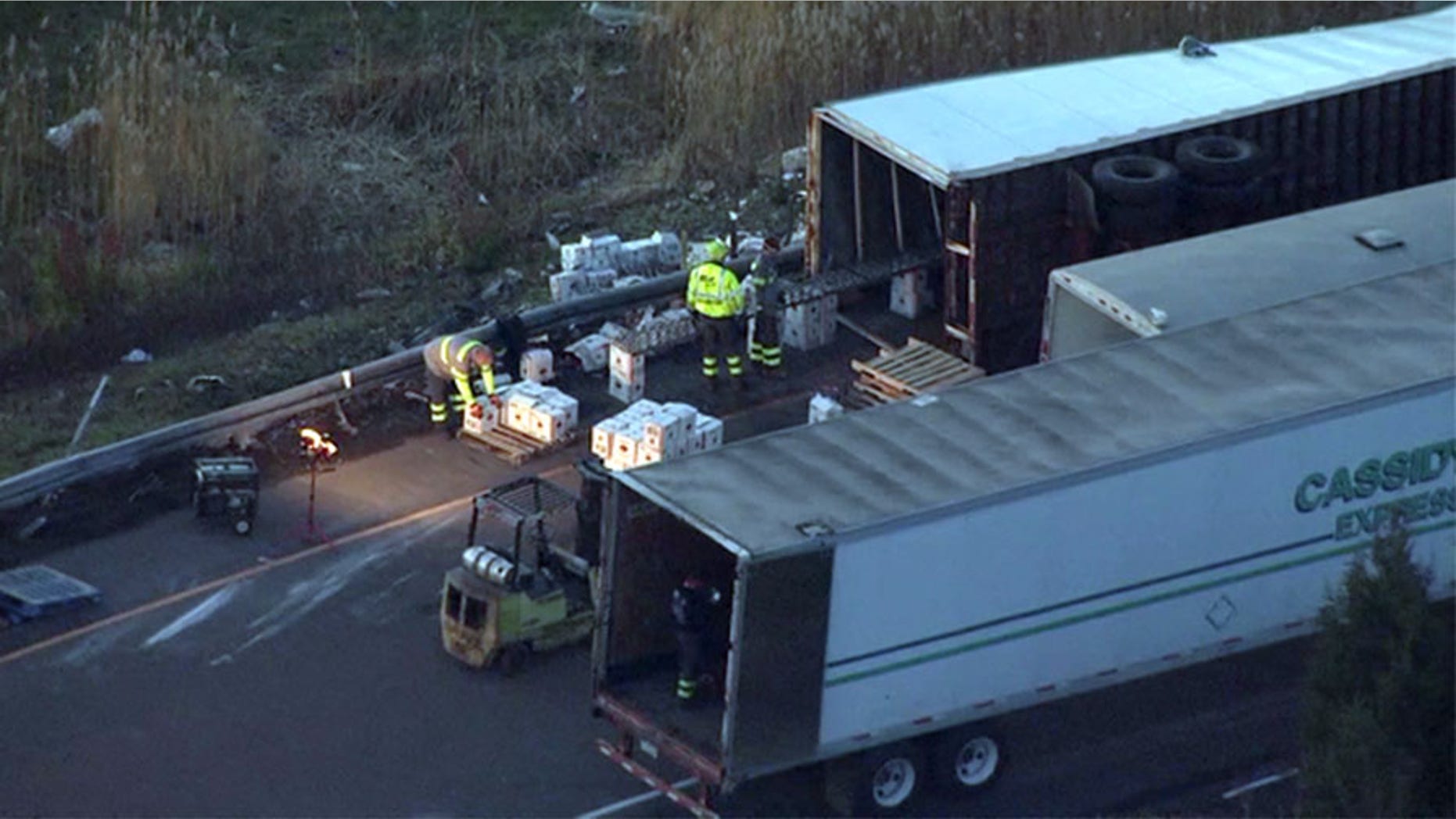 The exit ramp was shut down all morning while workers helped to move the vodka boxes.