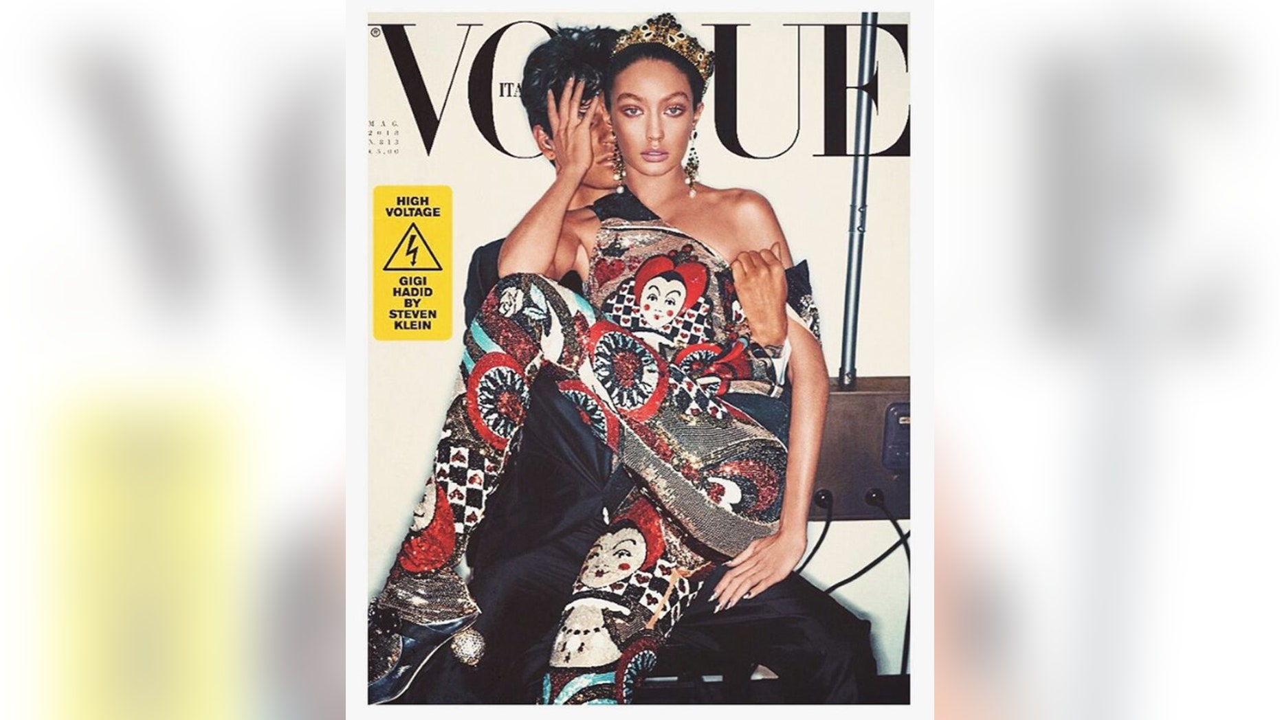 Gigi Hadid appears on the cover of Vogue Italia. Some are criticizing the magazine for seemingly darkening her skin.