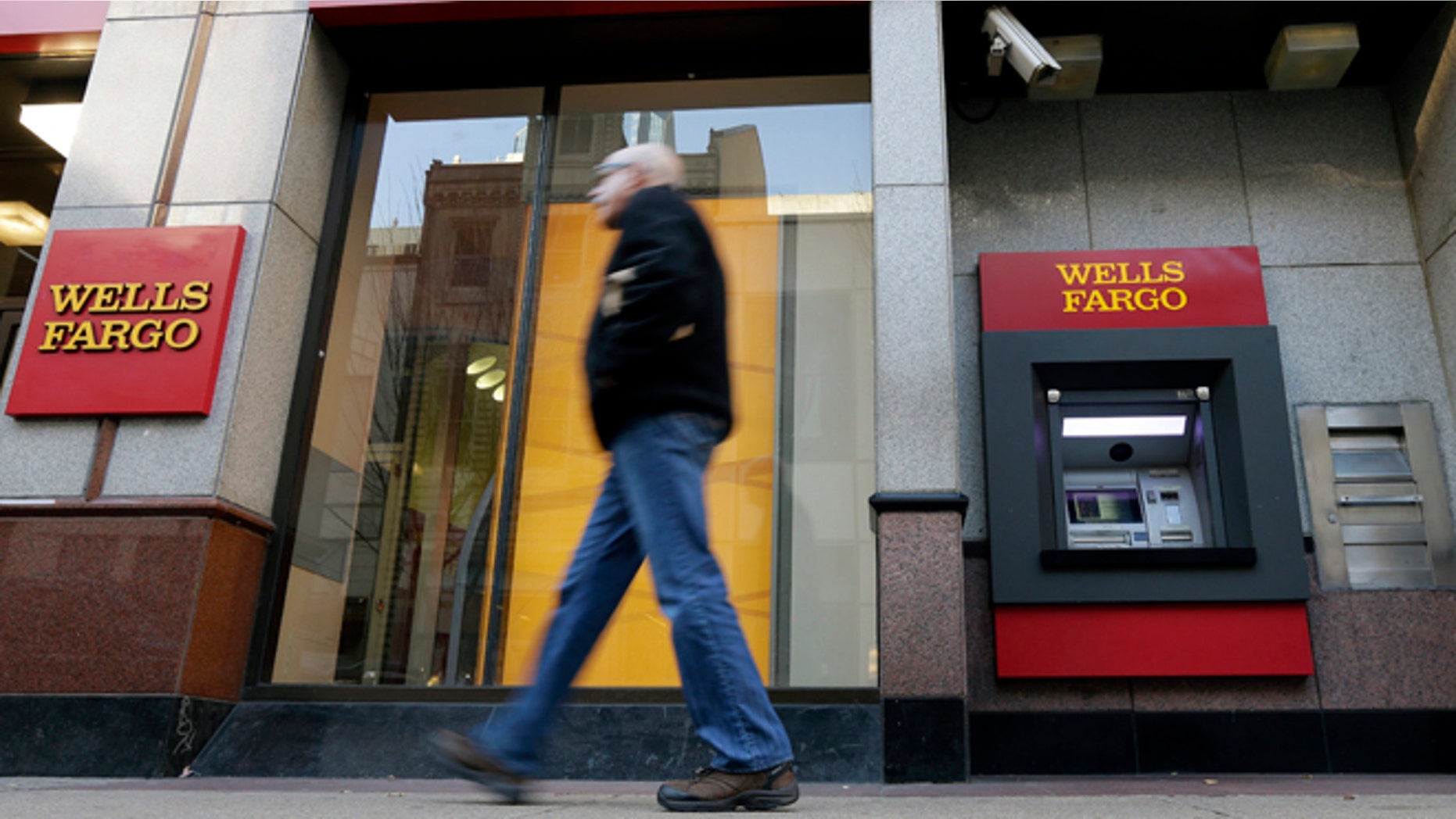 Dec. 19, 2012: A man walks past a Wells Fargo branch in Philadelphia.