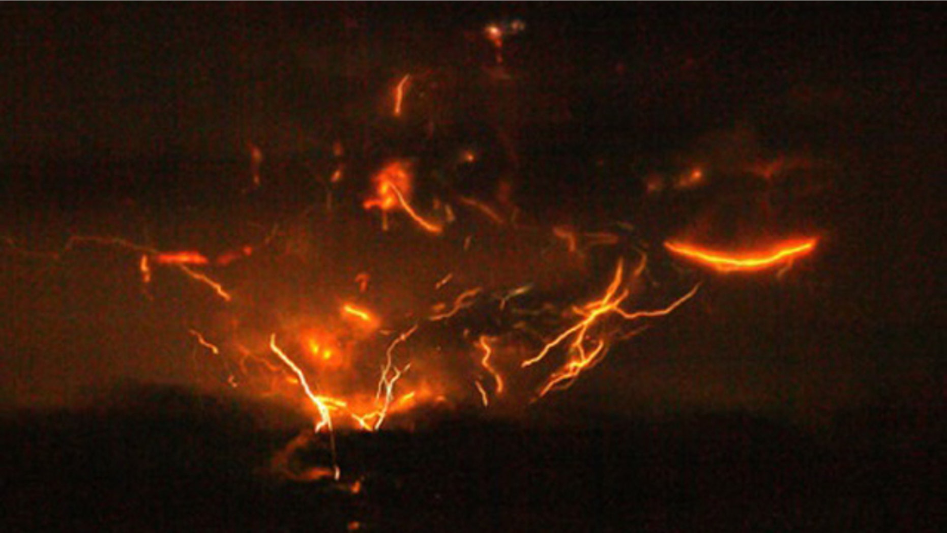 Lightning in the ash cloud atop Mount Redoubt from the eruption on March 28, 2009.