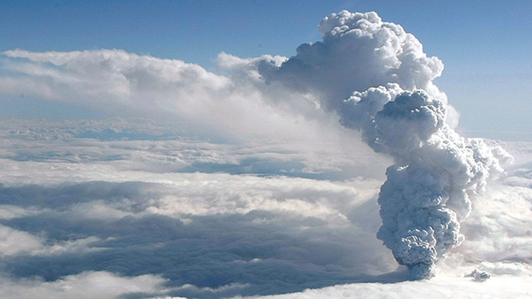 April 14: Smoke and steam rises from the volcano under the Eyjafjallajokull glacier in Iceland.