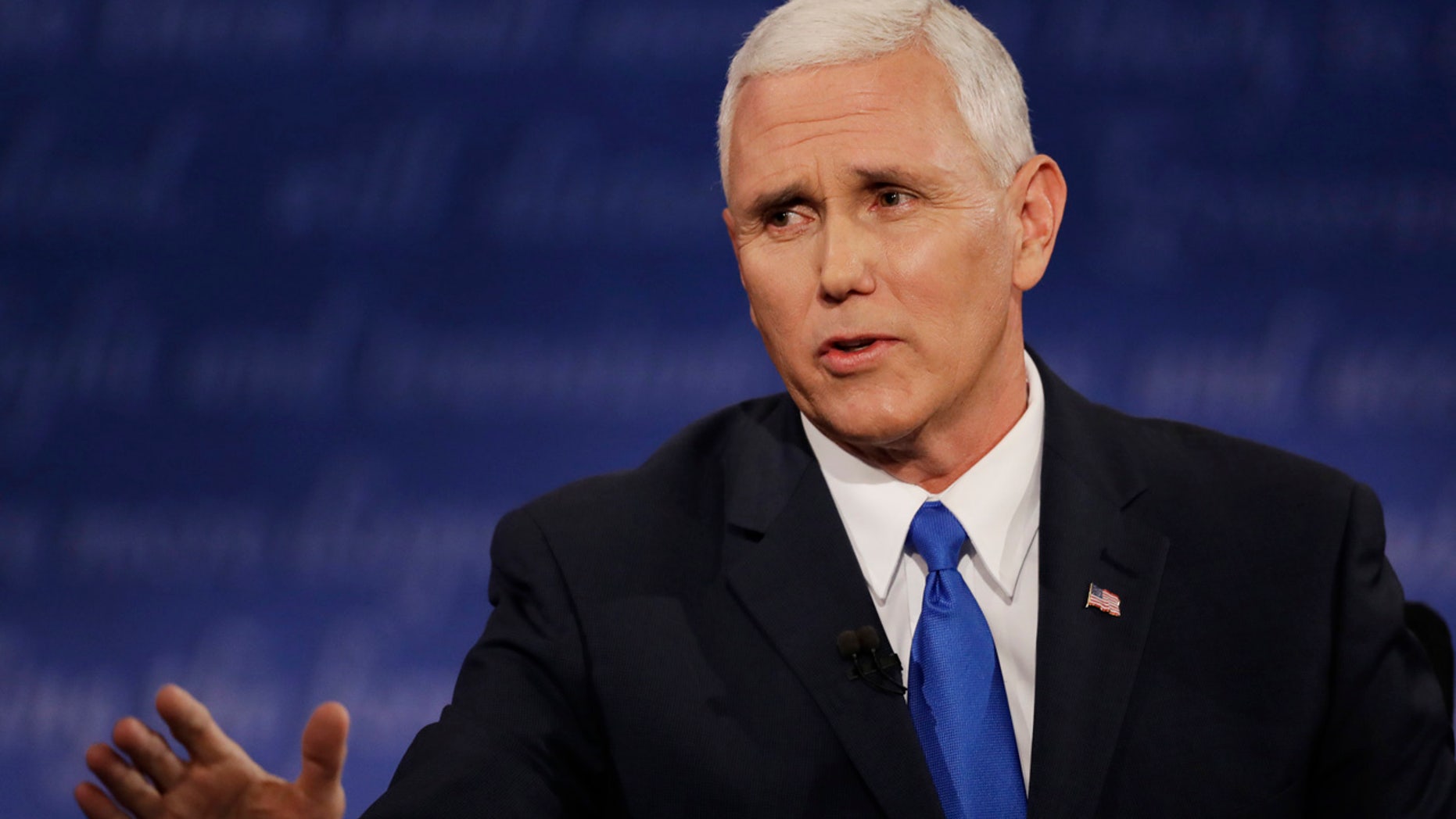 Republican vice-presidential nominee Gov. Mike Pence speaks to Democratic vice-presidential nominee Sen. Tim Kaine during the vice-presidential debate at Longwood University in Farmville, Va., Tuesday, Oct. 4, 2016. (AP Photo/Patrick Semansky)