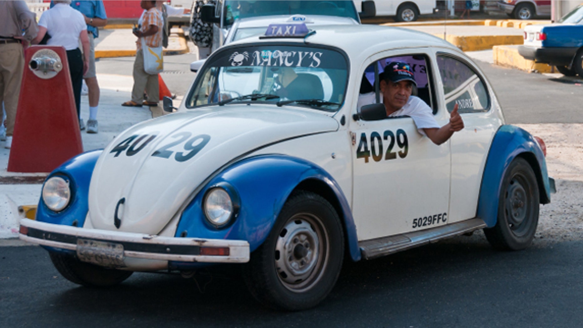 VW Beetle Taxi on the streets of Acapulco, Mexico