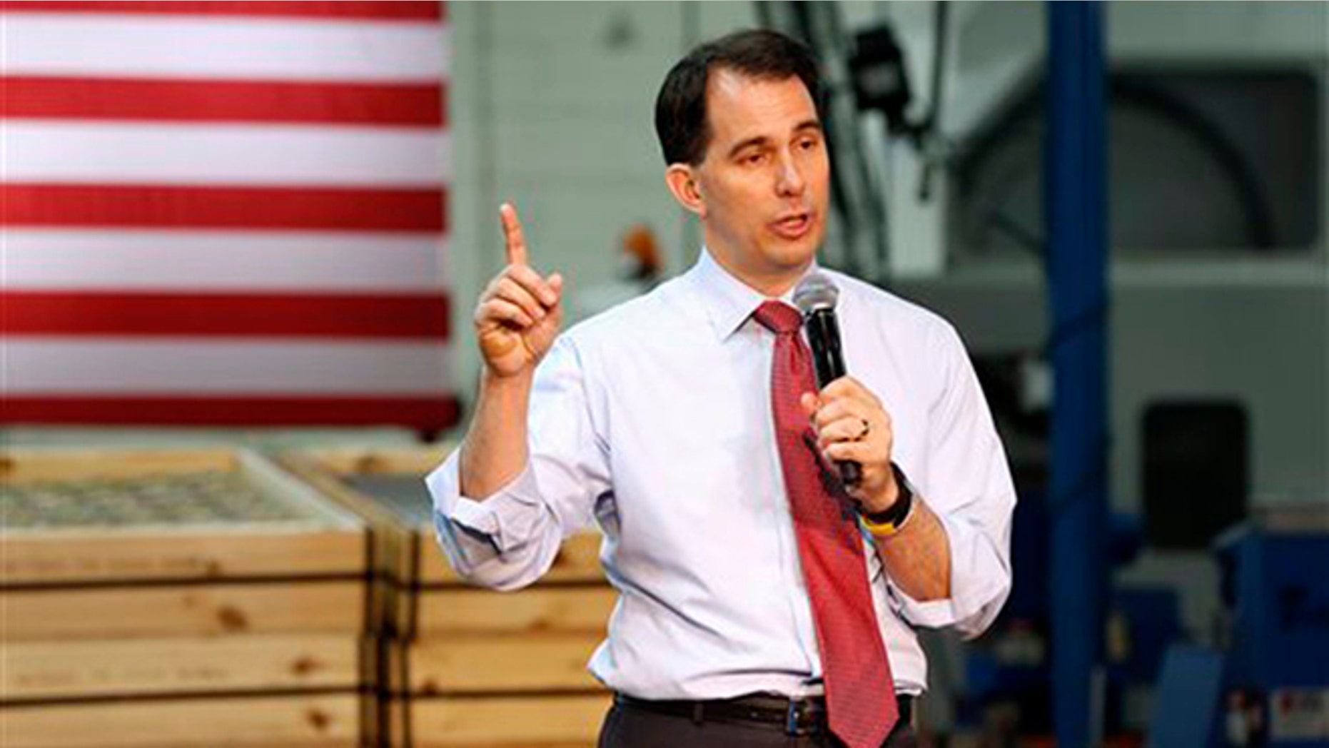 FILE - In this Aug. 18, 2015 file photo, Republican presidential candidate, Wisconsin Gov. Scott Walker, speaks in Brooklyn Center, Minn., where he presented his plan to replacing President Barack Obama's health care law. (AP Photo/Jim Mone, File)