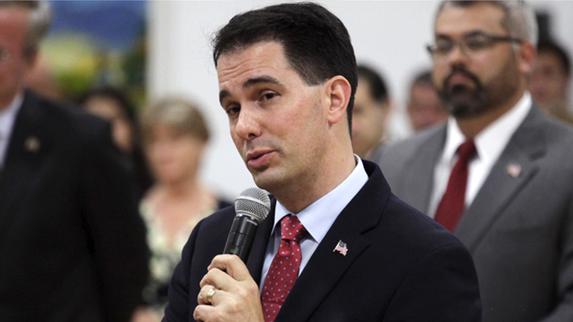 Nov. 9, 2015: Wisconsin Governor Scott Walker speaks at the La Casa de Esperanza school where he and Republican presidential candidate Jeb Bush spoke about education reform, in Waukesha, Wisconsin.
