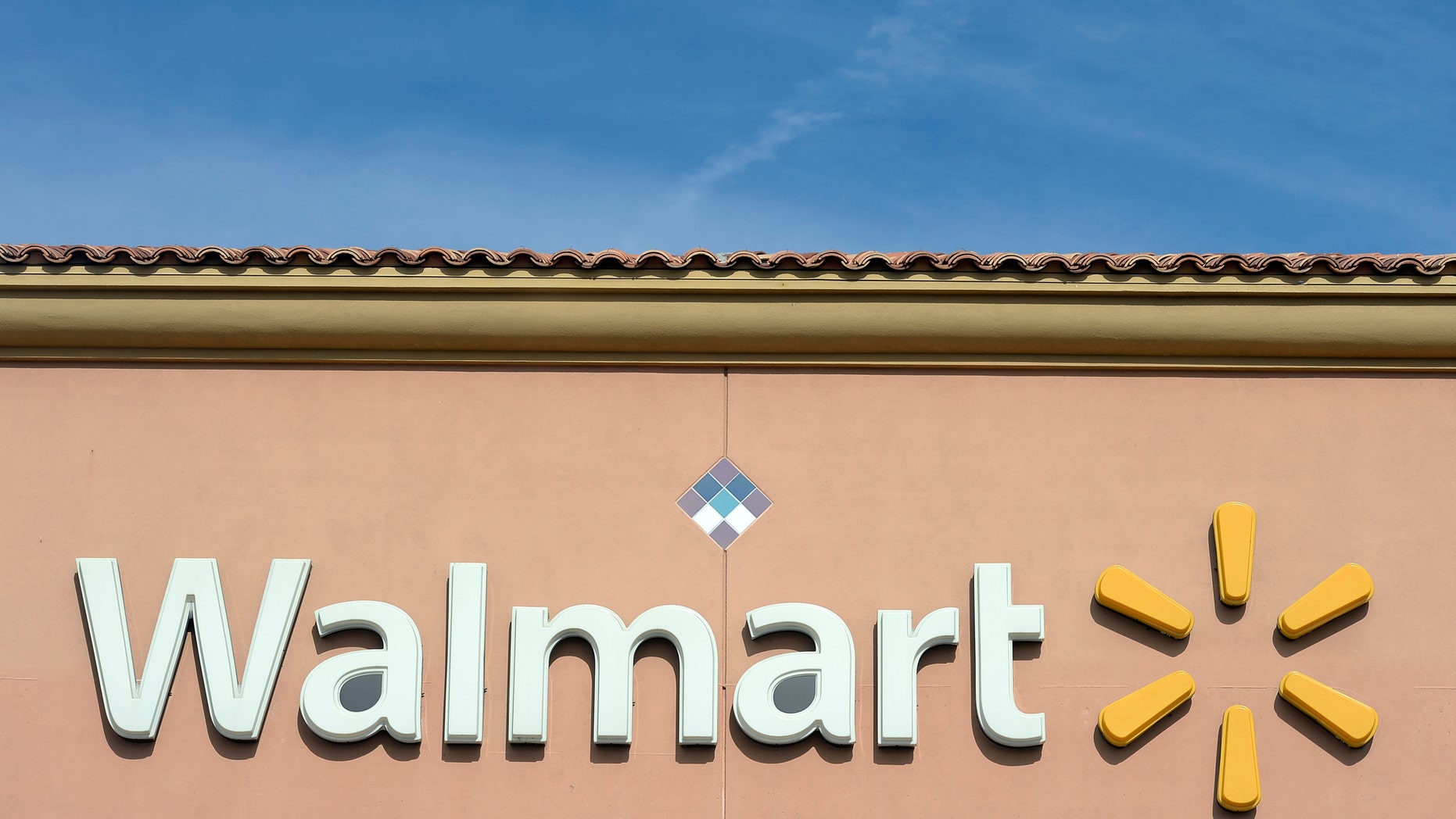 File photo - The Walmart logo is pictured at its store in the Porter Ranch section of Los Angeles Nov. 26, 2013. (REUTERS/Kevork Djansezian)