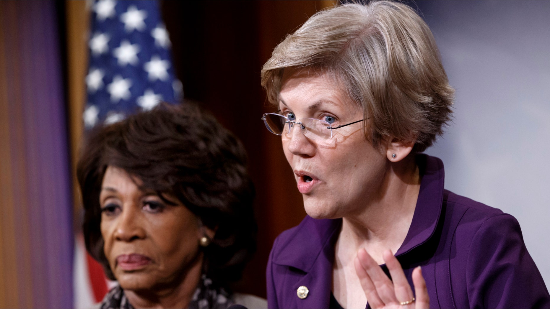 Dec. 10, 2014: Sen. Elizabeth Warren, D-Mass., a member of the Senate Banking Committee, right, and Rep. Maxine Waters, D-Calif.