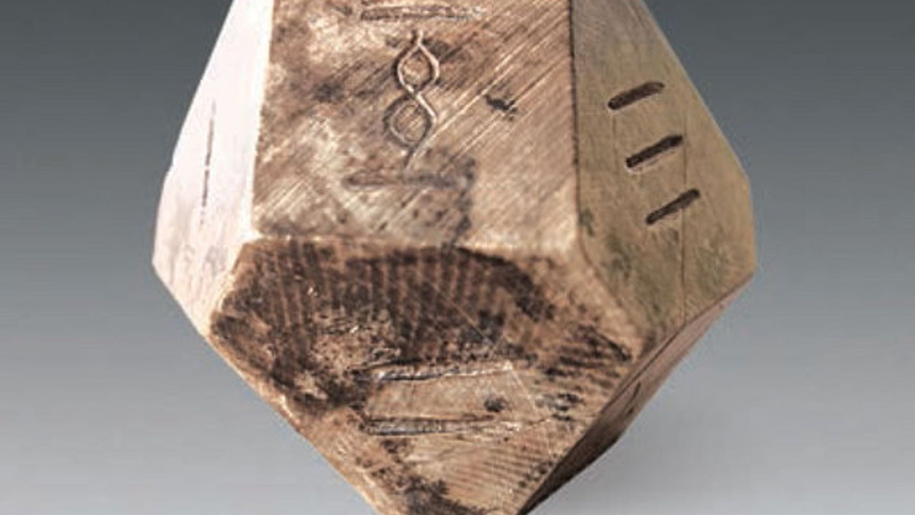 Archaeologists think this 14-face die was used to play a game called "bo" that hasn't been played in 1,500 years.