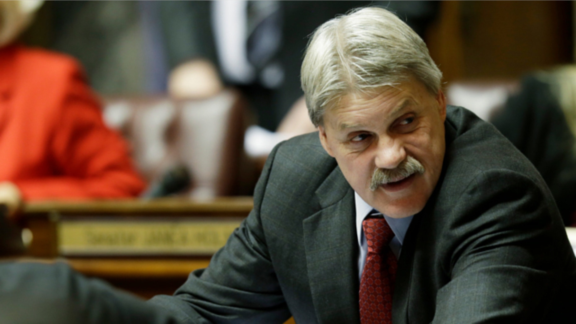 Jan. 14, 2013: Sen. Tim Sheldon, D-Potlatch, sits at his desk on the Senate floor at the Capitol in Olympia, Wash.