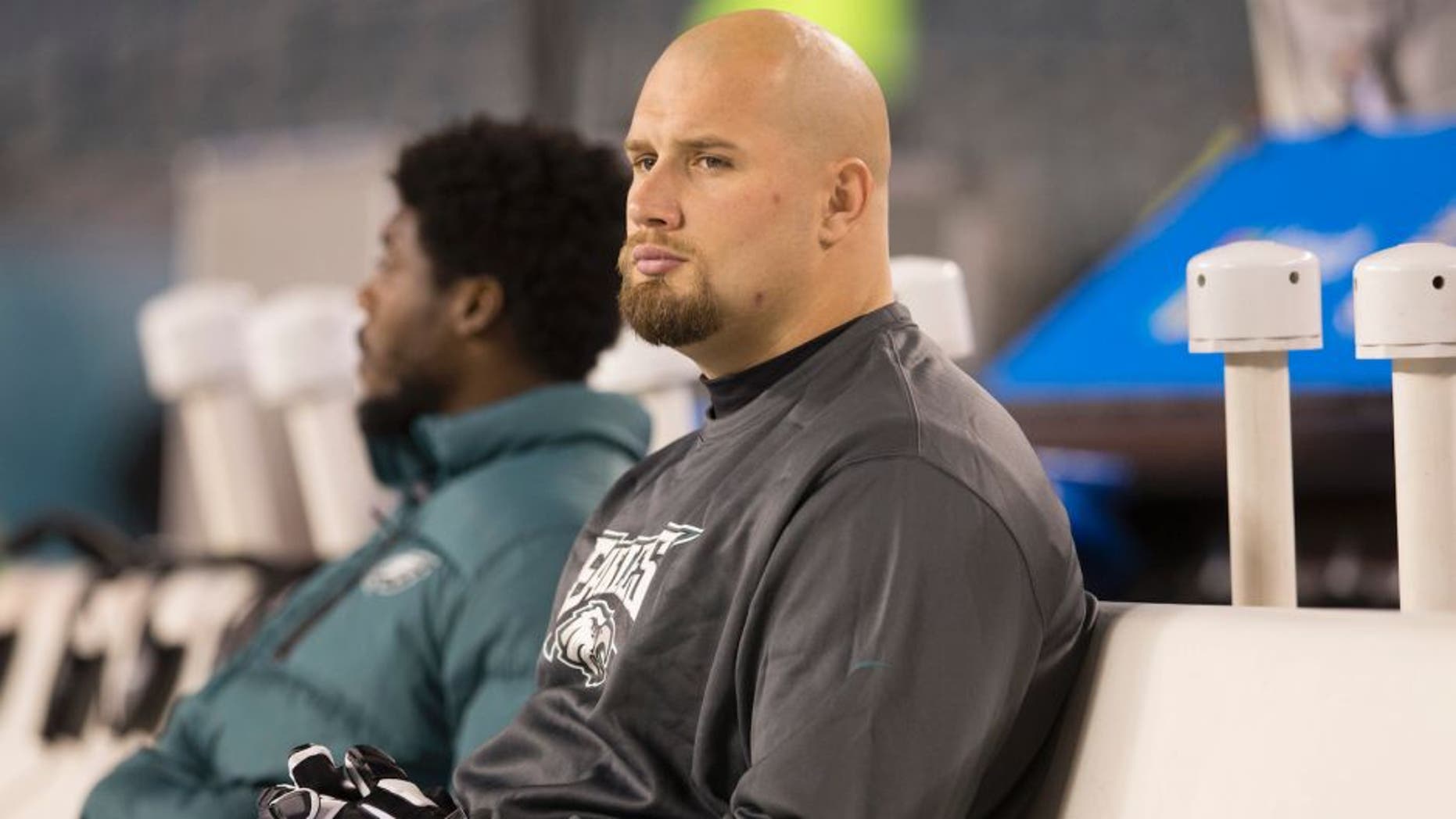 PHILADELPHIA, PA - DECEMBER 26: Lane Johnson #65 of the Philadelphia Eagles sits on the bench prior to the game against the Washington Redskins on December 26, 2015 at Lincoln Financial Field in Philadelphia, Pennsylvania. (Photo by Mitchell Leff/Getty Images)