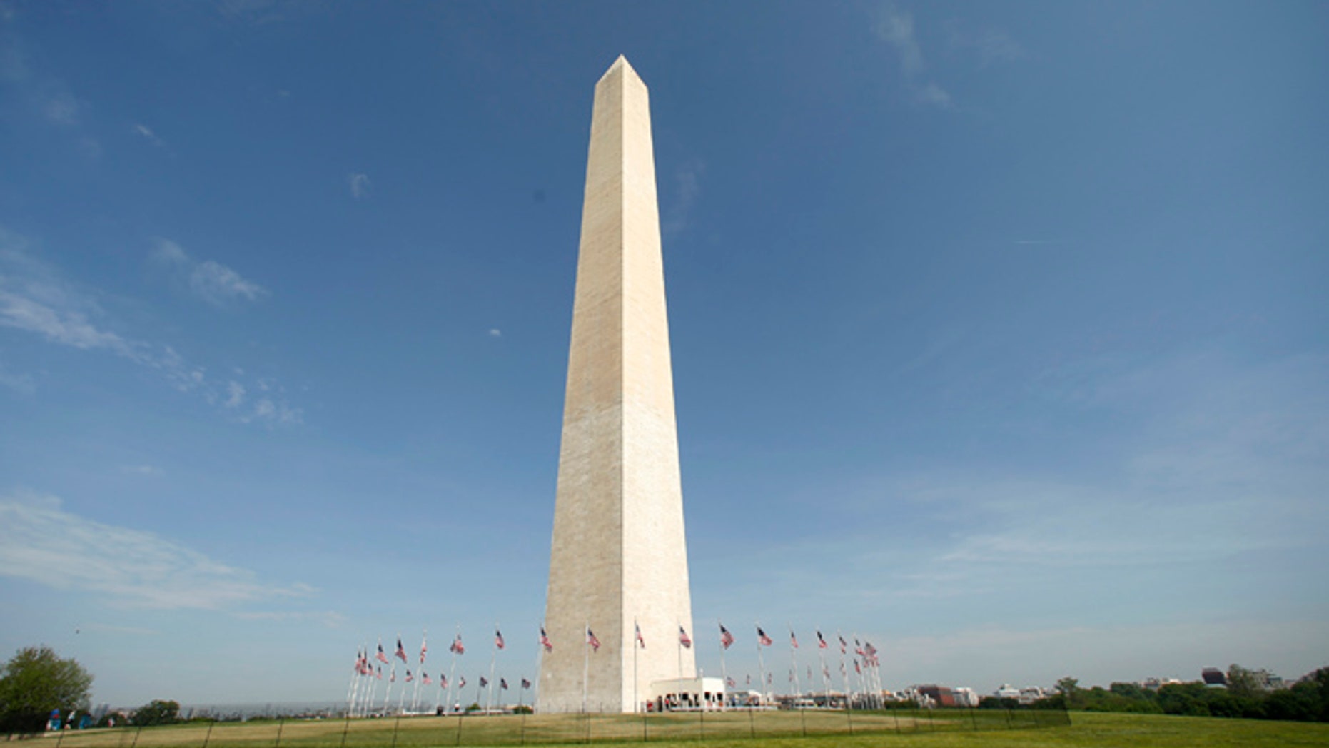Free from its scaffolding, the Washington Monument is re-opened to the public May 12, 2014. The monument has been closed since 2011 after it suffered widespread damage caused by a 5.8 magnitude earthquake along the East Coast.
REUTERS/Kevin Lamarque (UNITED STATES - Tags: SOCIETY DISASTER) - RTR3OTS0