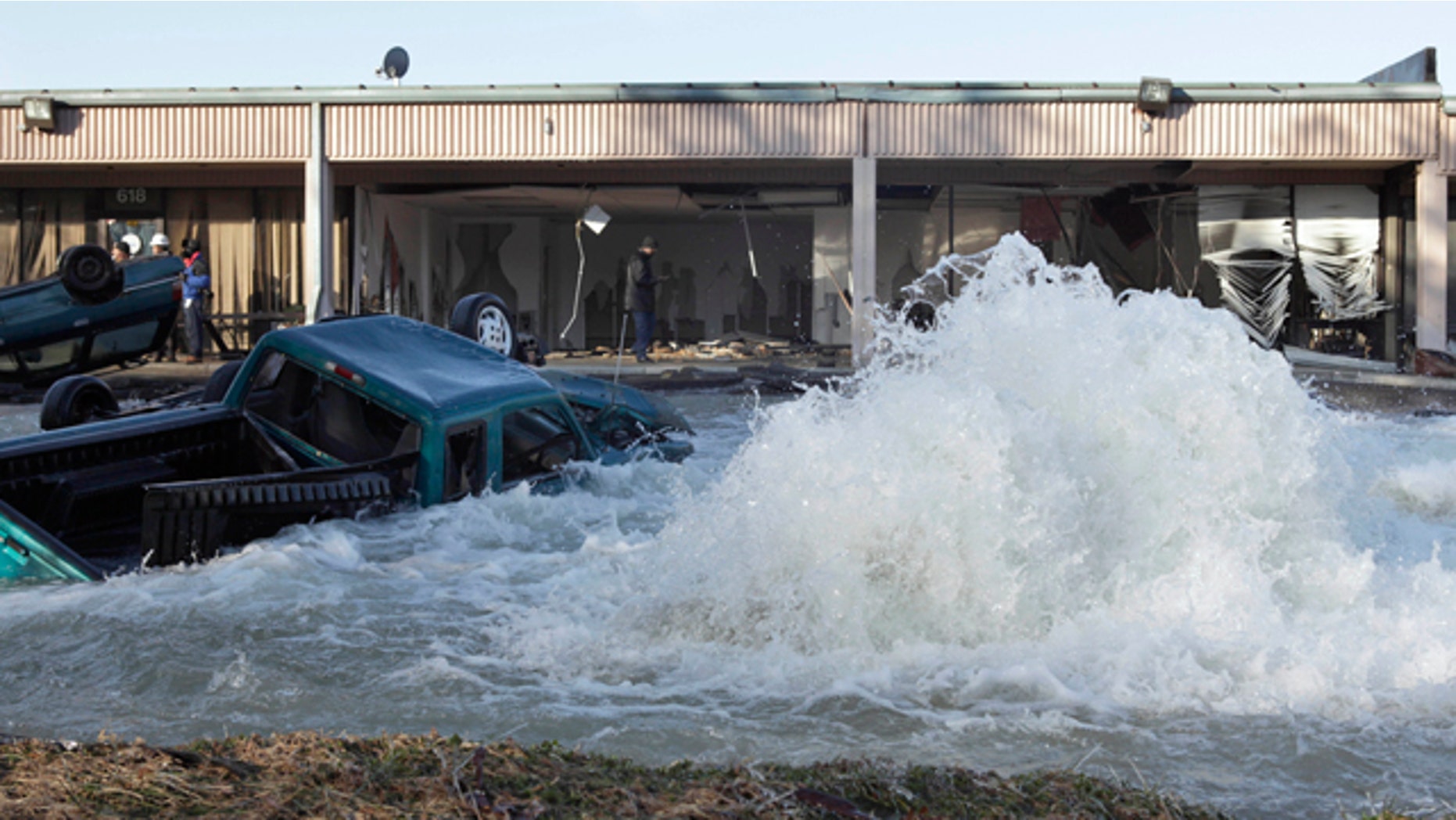 Jan. 24: A water main break is seen at an industrial park next to the Capital Beltway in Capitol Heights, Md. The break outside Washington has sent water pouring from a 54-inch pipe, prompting the closure of the inner loop of the Capital Beltway in Maryland and snarling morning traffic. (AP)