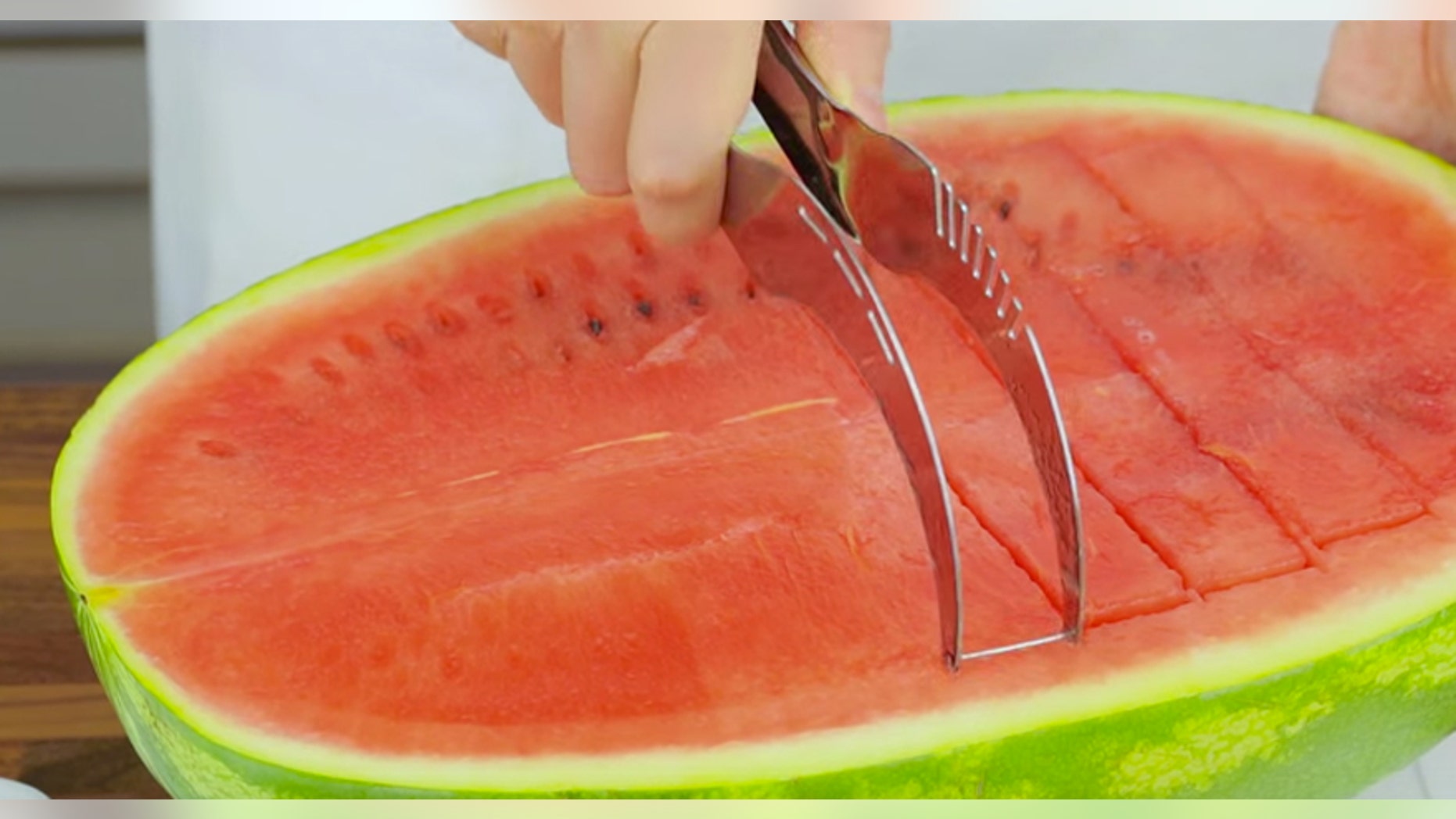 This cool tool cuts and lifts watermelon.