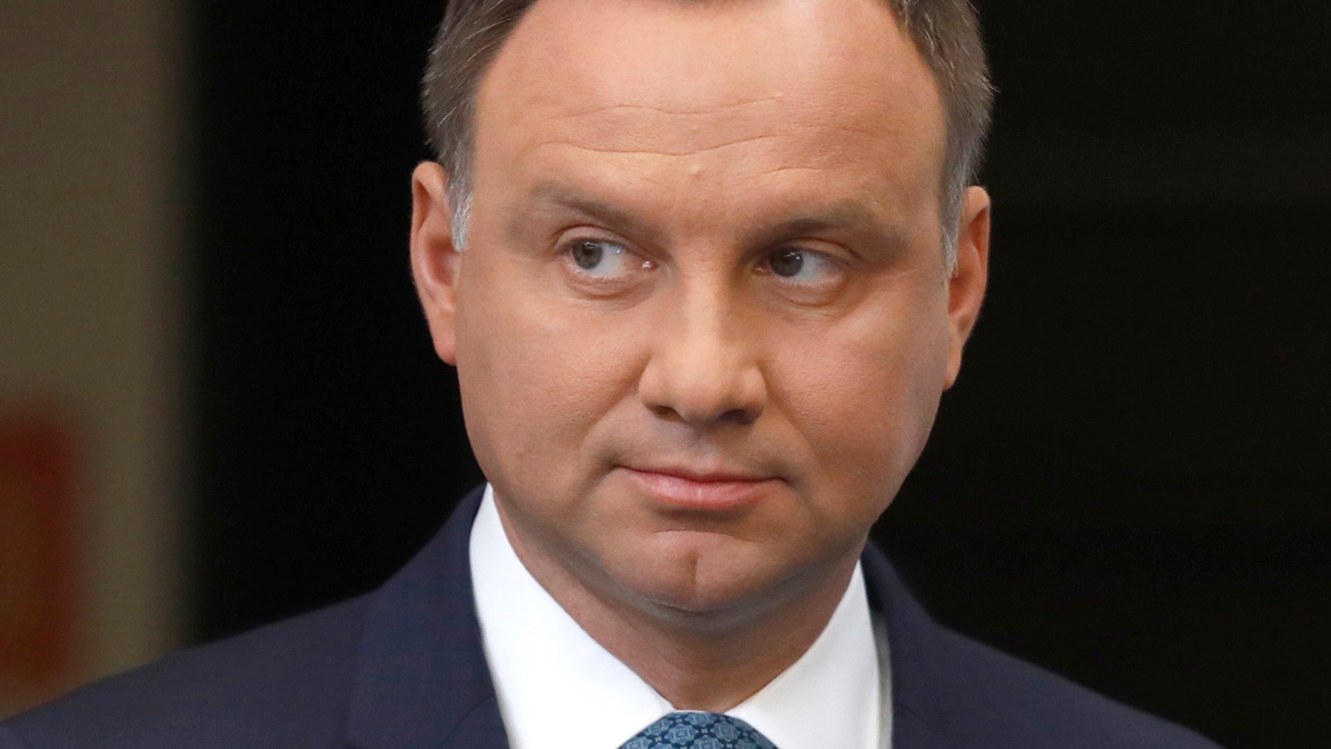 FILE: President Andrzej Duda looks on after his media announcement about Supreme Court legislation at Presidential Palace in Warsaw