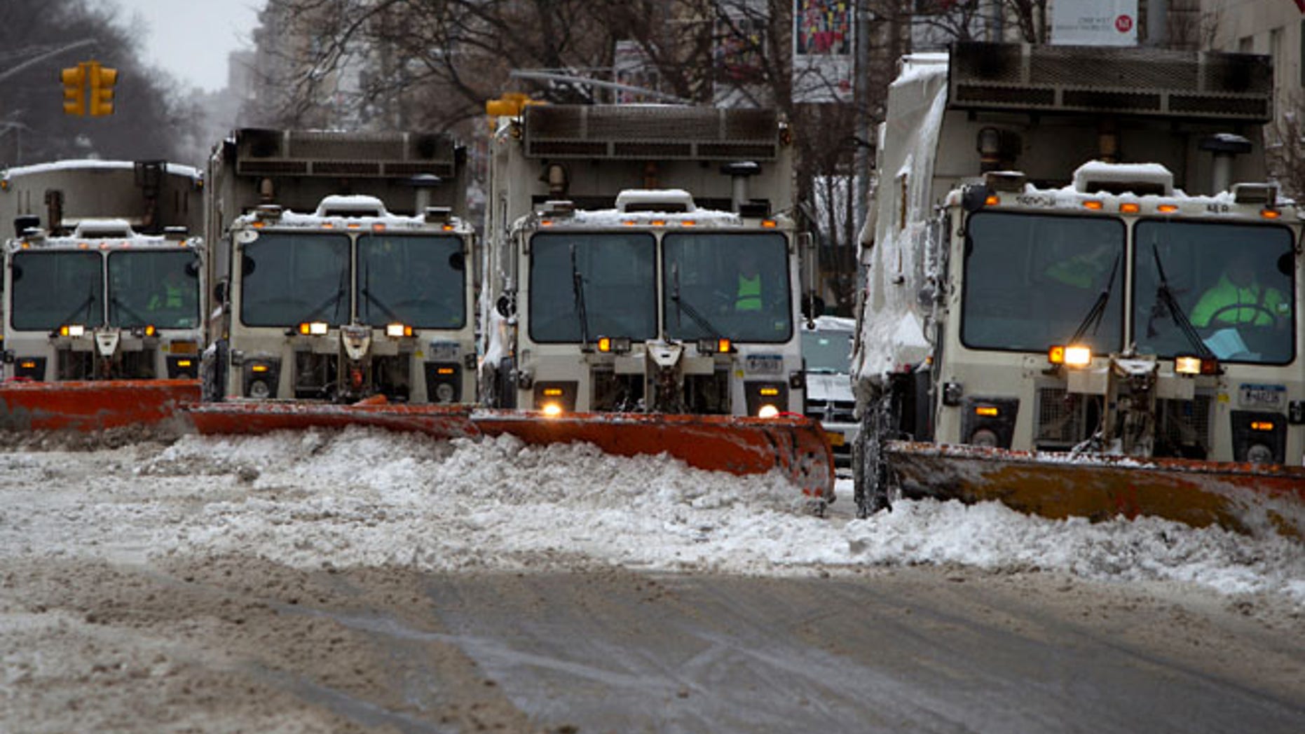 The body of a man shot in the head was found by a snow plow Wednesday in Brooklyn.