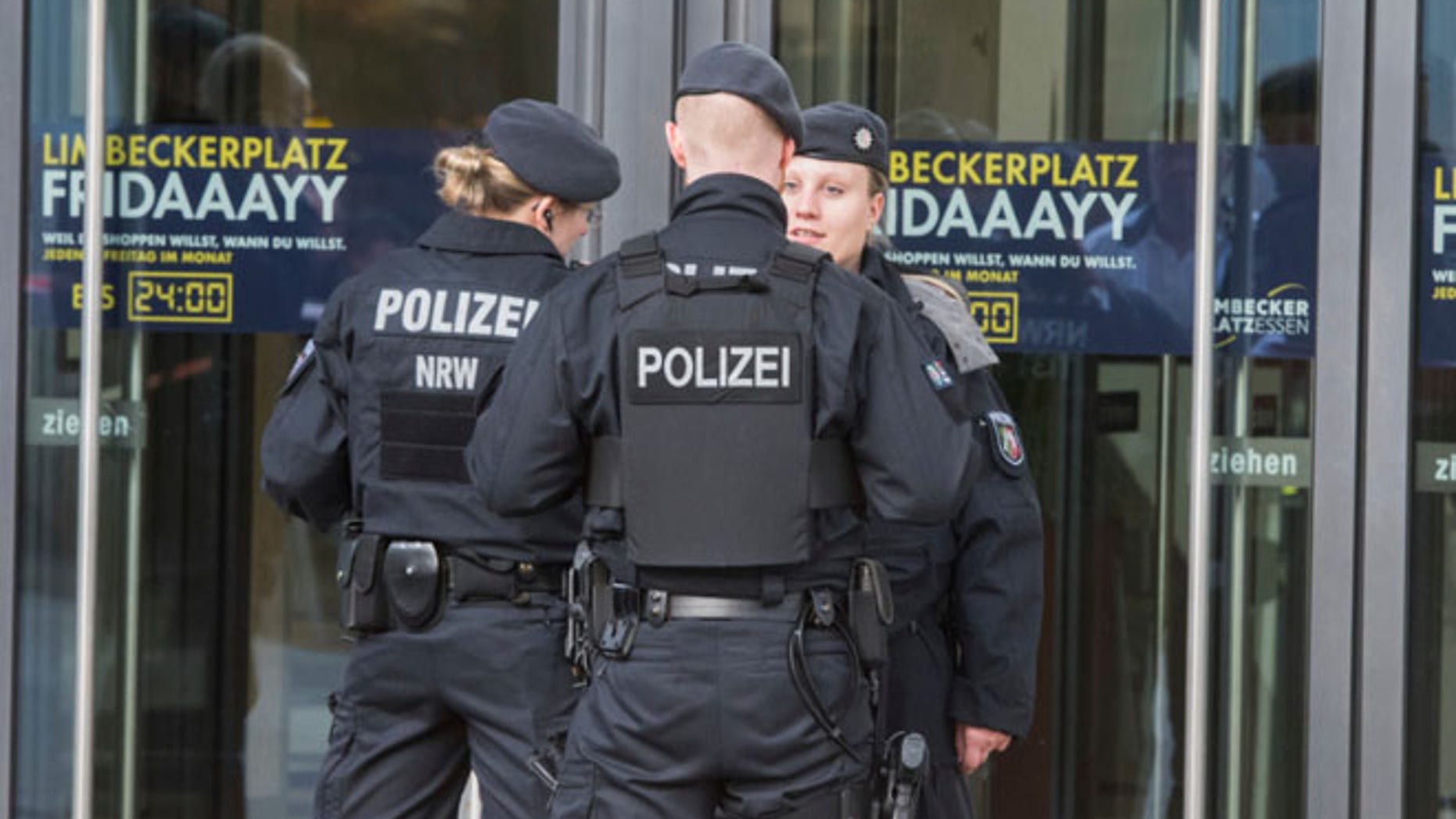 MARCH 11: Police guard in front of a shopping mall in Essen, Germany